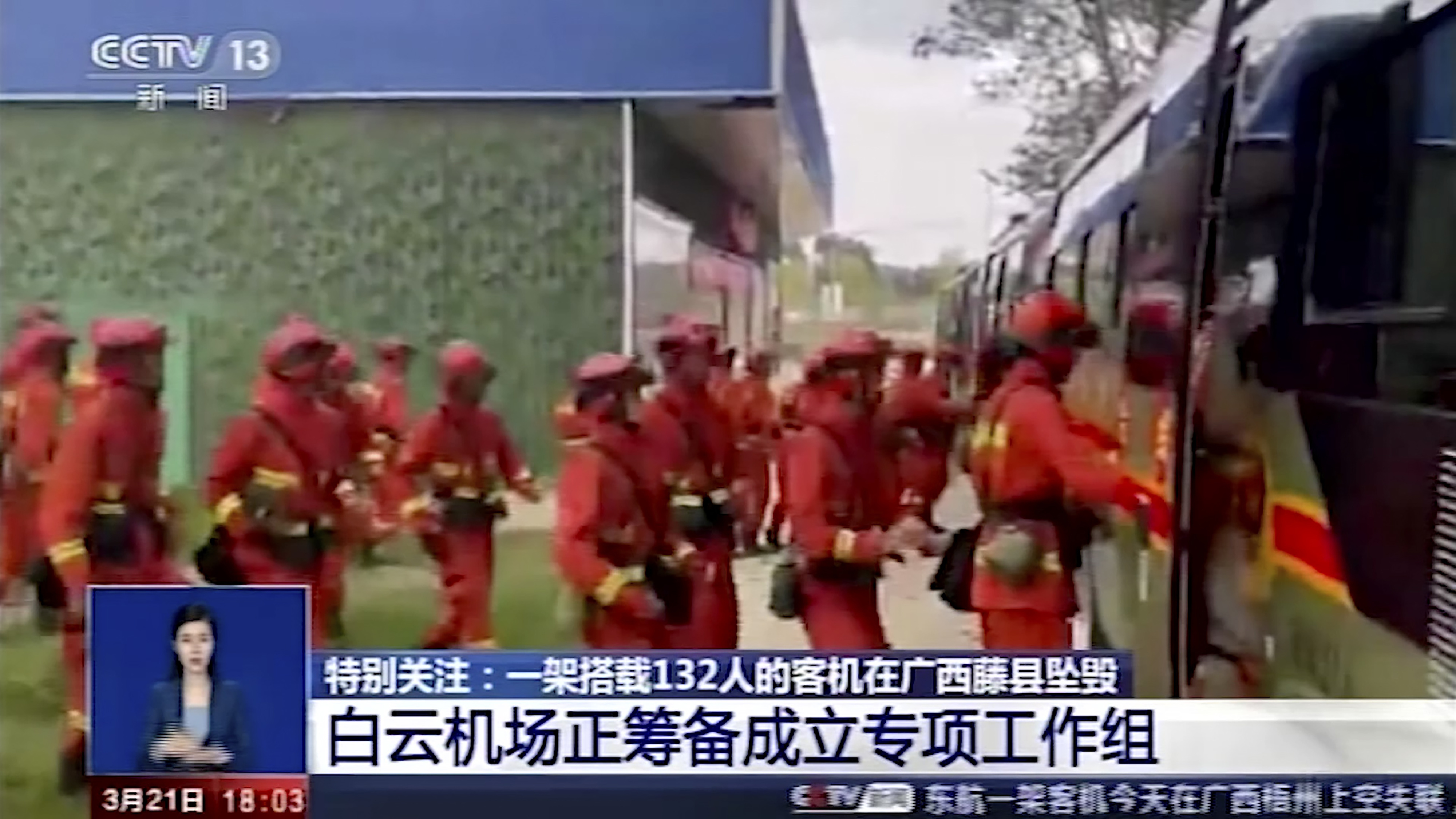 Emergency personnel prepare to travel to the site of a plane crash near Wuzhou in southwestern China's Guangxi Zhuang Autonomous Region 