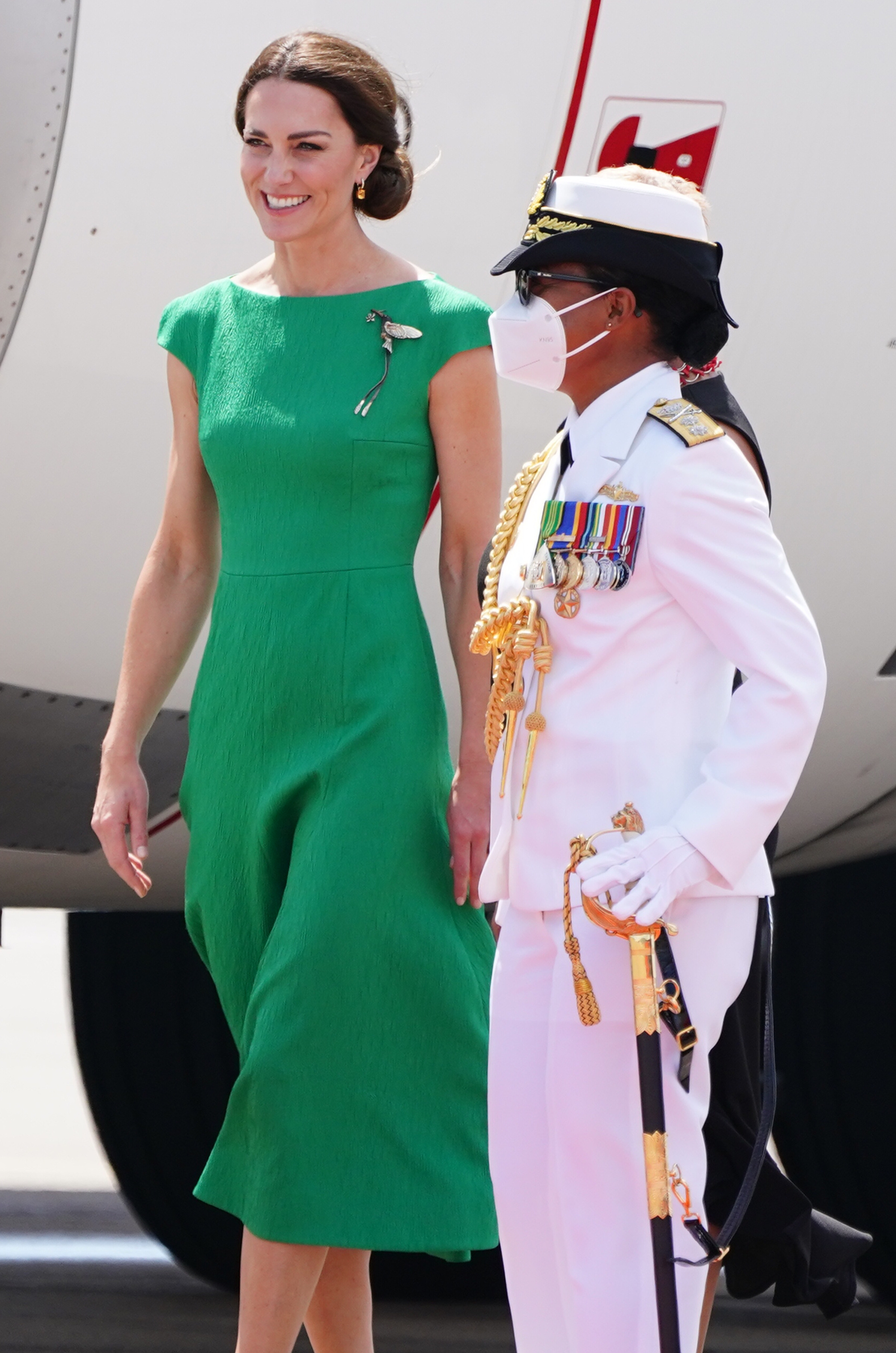 The Duchess of Cambridge walks to a waiting aircraft during her departure at Norman Manley International Airport, in Jamaica