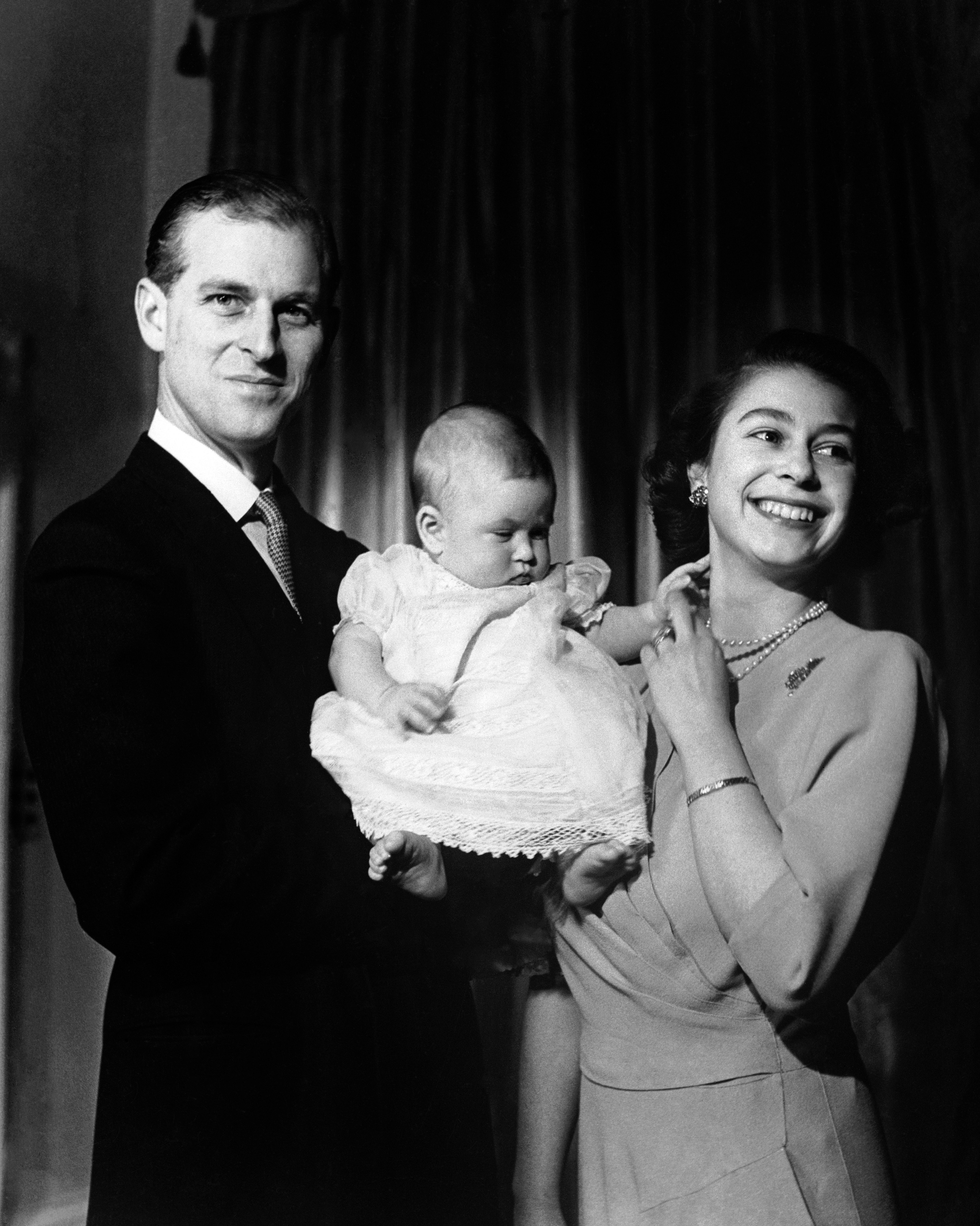 Princess Elizabeth and the Duke of Edinburgh hold their first child Prince Charles