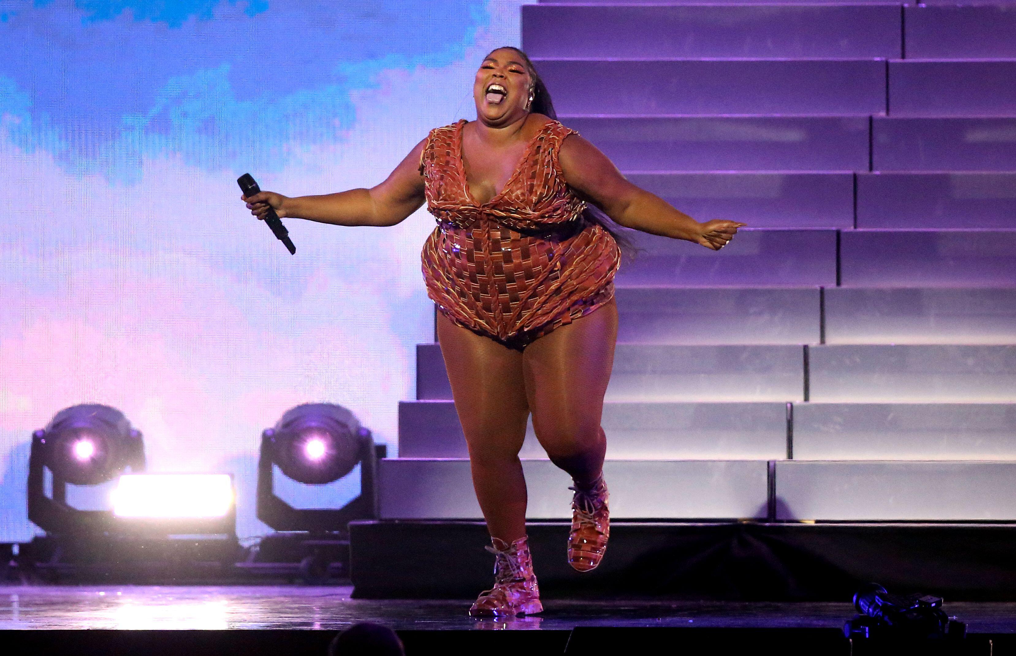 Lizzo Dances in a Vibrant Yitty Onesie on Instagram