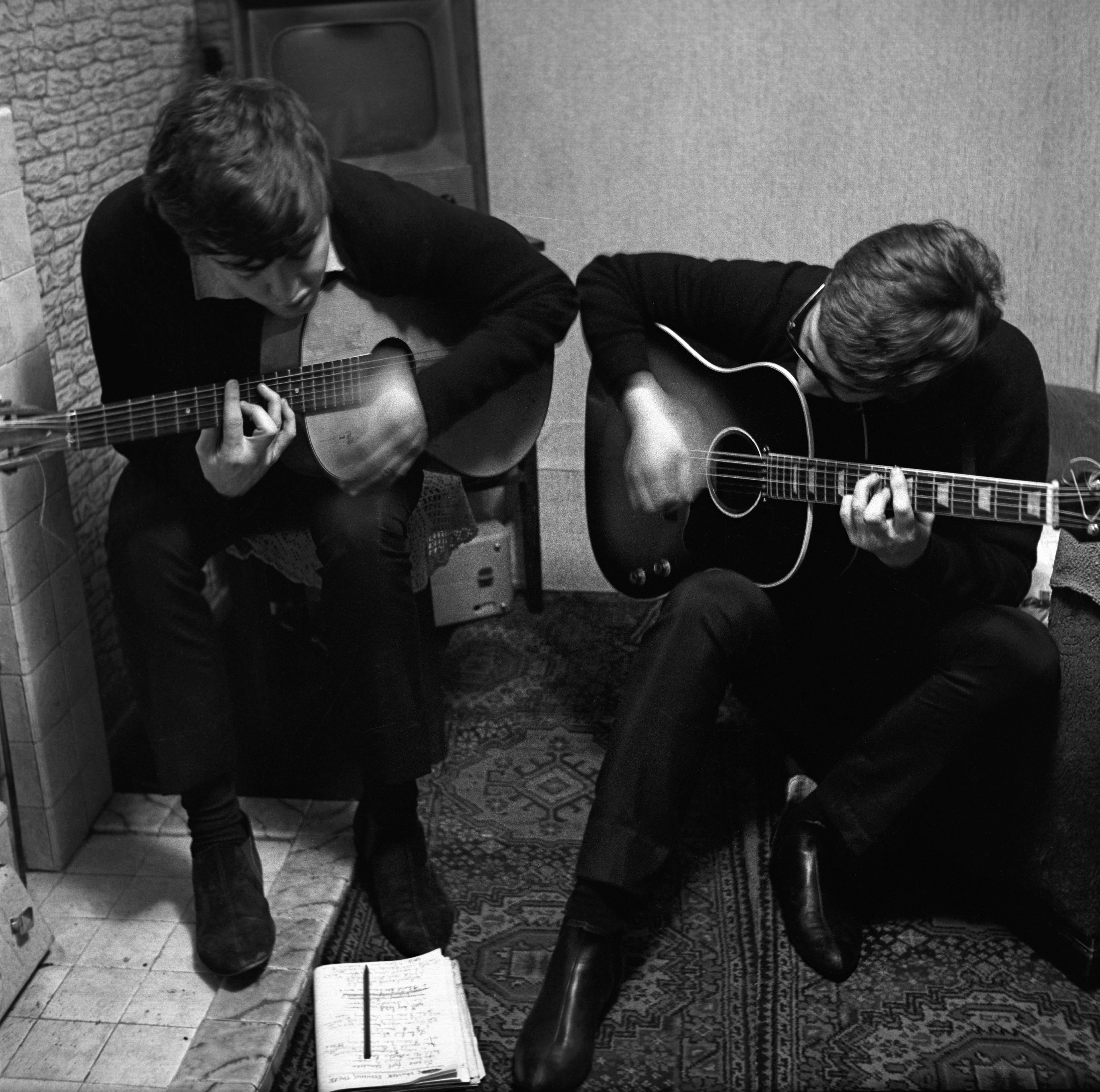 Sir Paul McCartney and John Lennon writing I Saw Her Standing There in Sir Paul's childhood home on Forthlin Road in Allerton, Liverpool (Mike McCartney/PA)