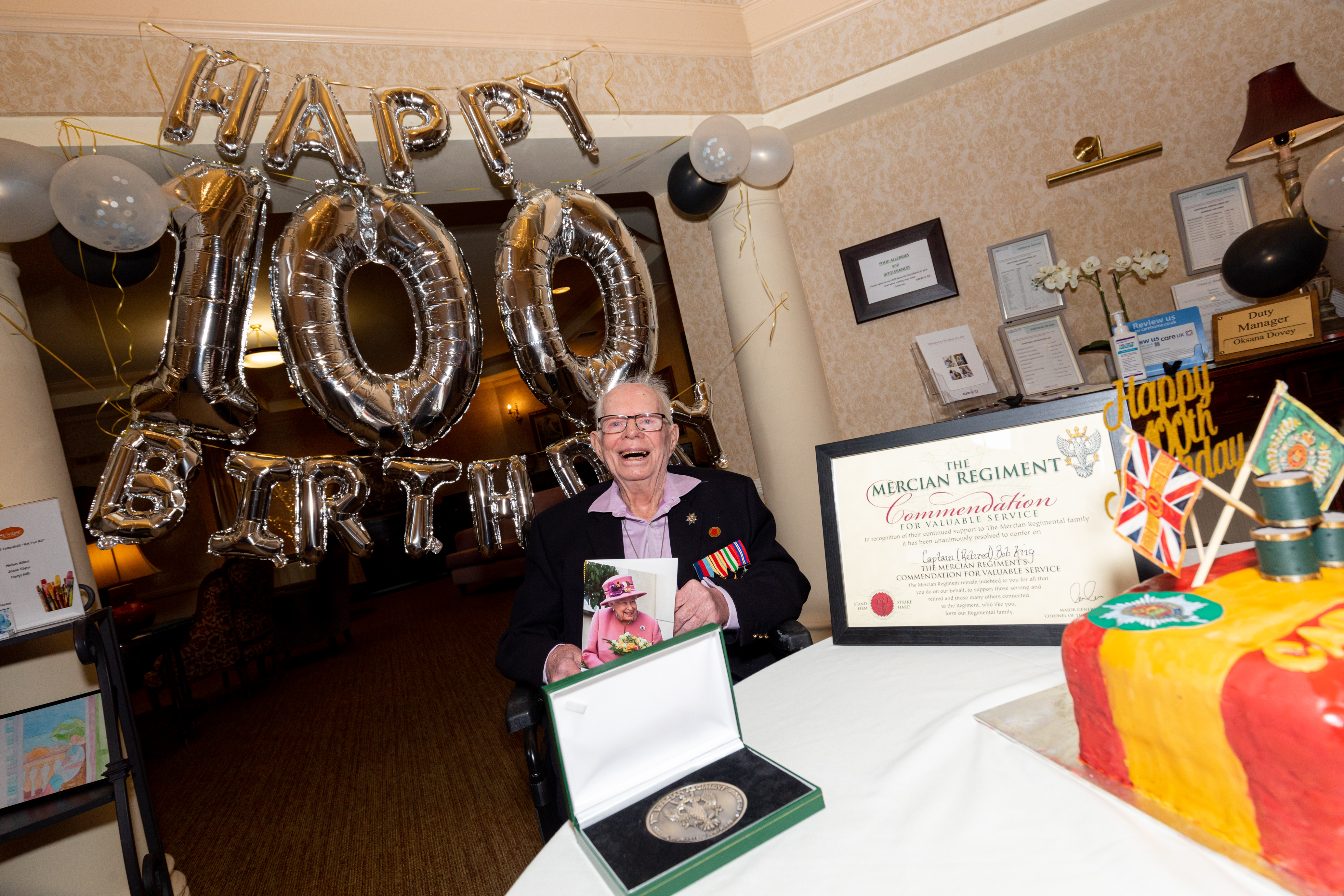 Bob King pictured celebrating his 100th Birthday at Care UK Foxland Grange