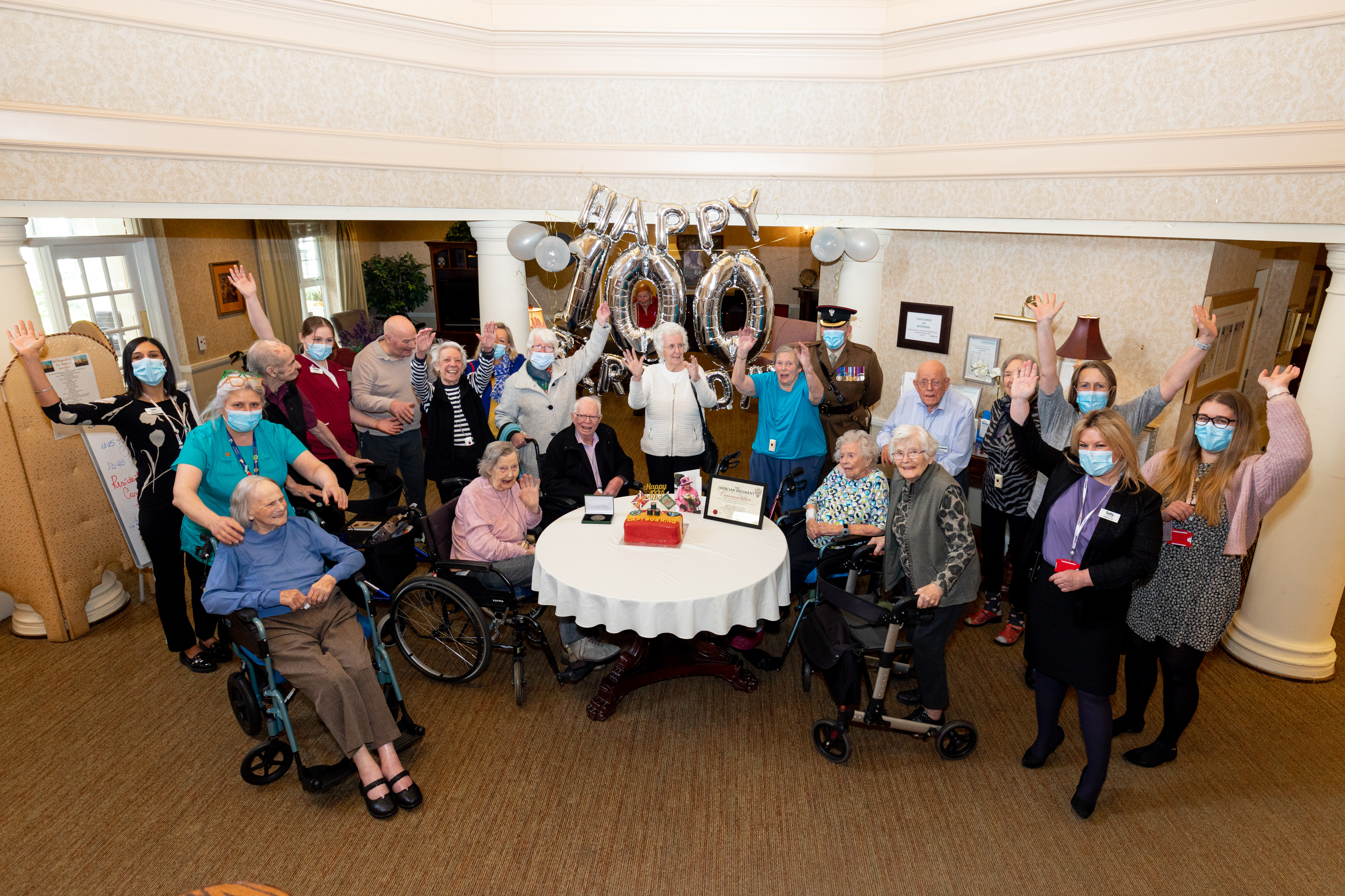 The team at Foxland Grange celebrate Bob's 100th birthday