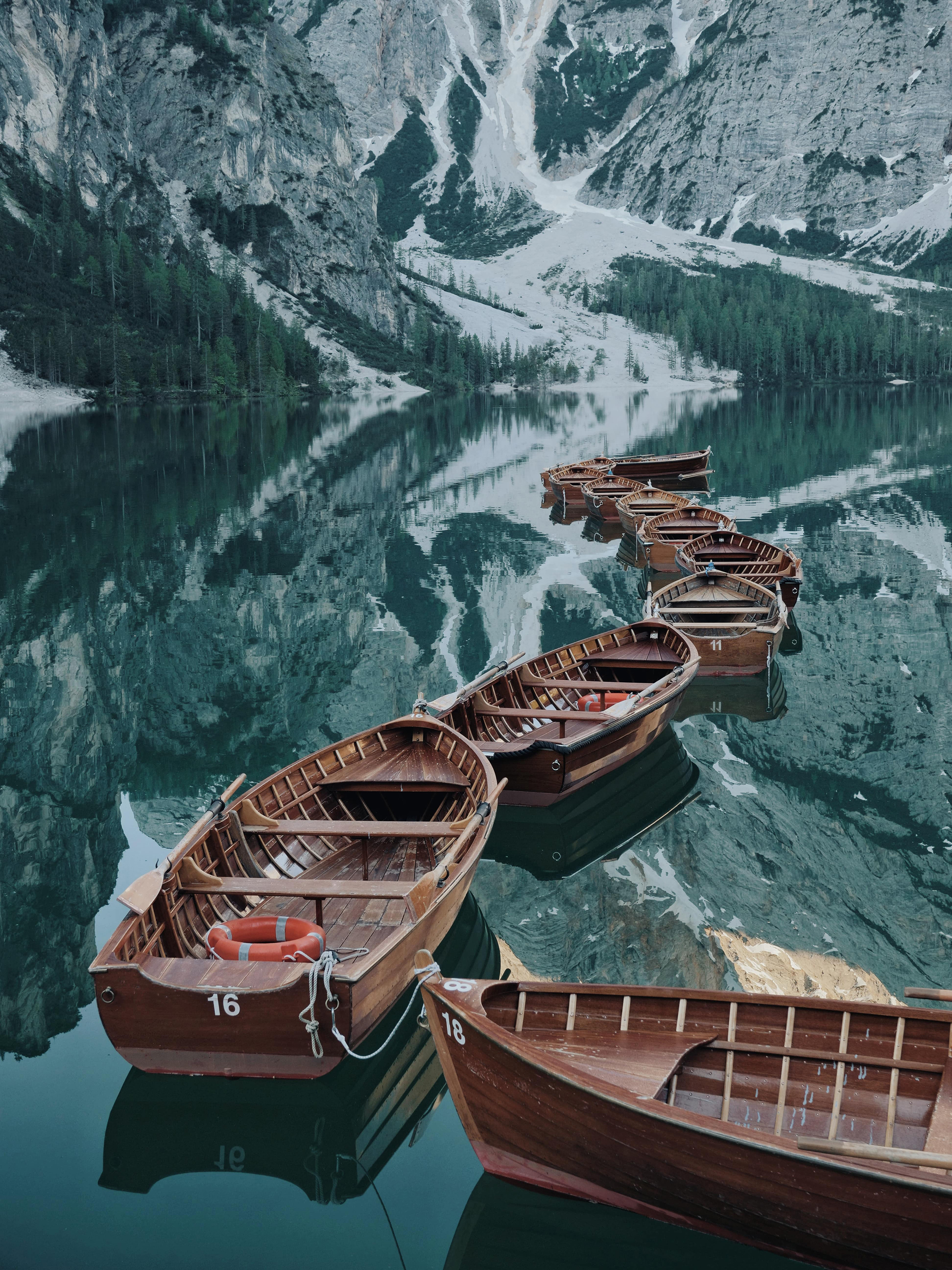 Mountain river in Italy, boats floating