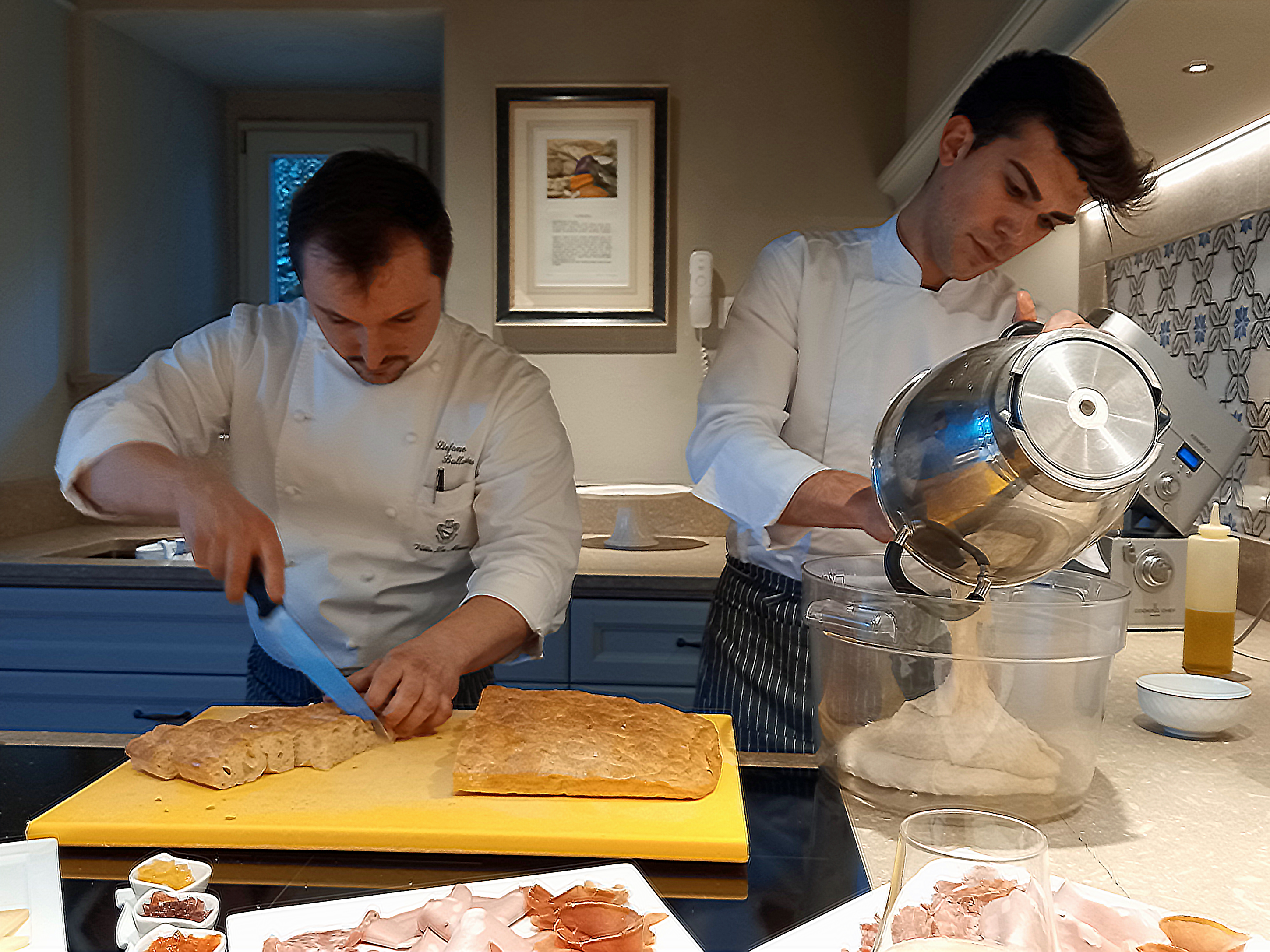 Chef Stefano Barrillo (left) leads a cookery demonstration at Villa La Massa