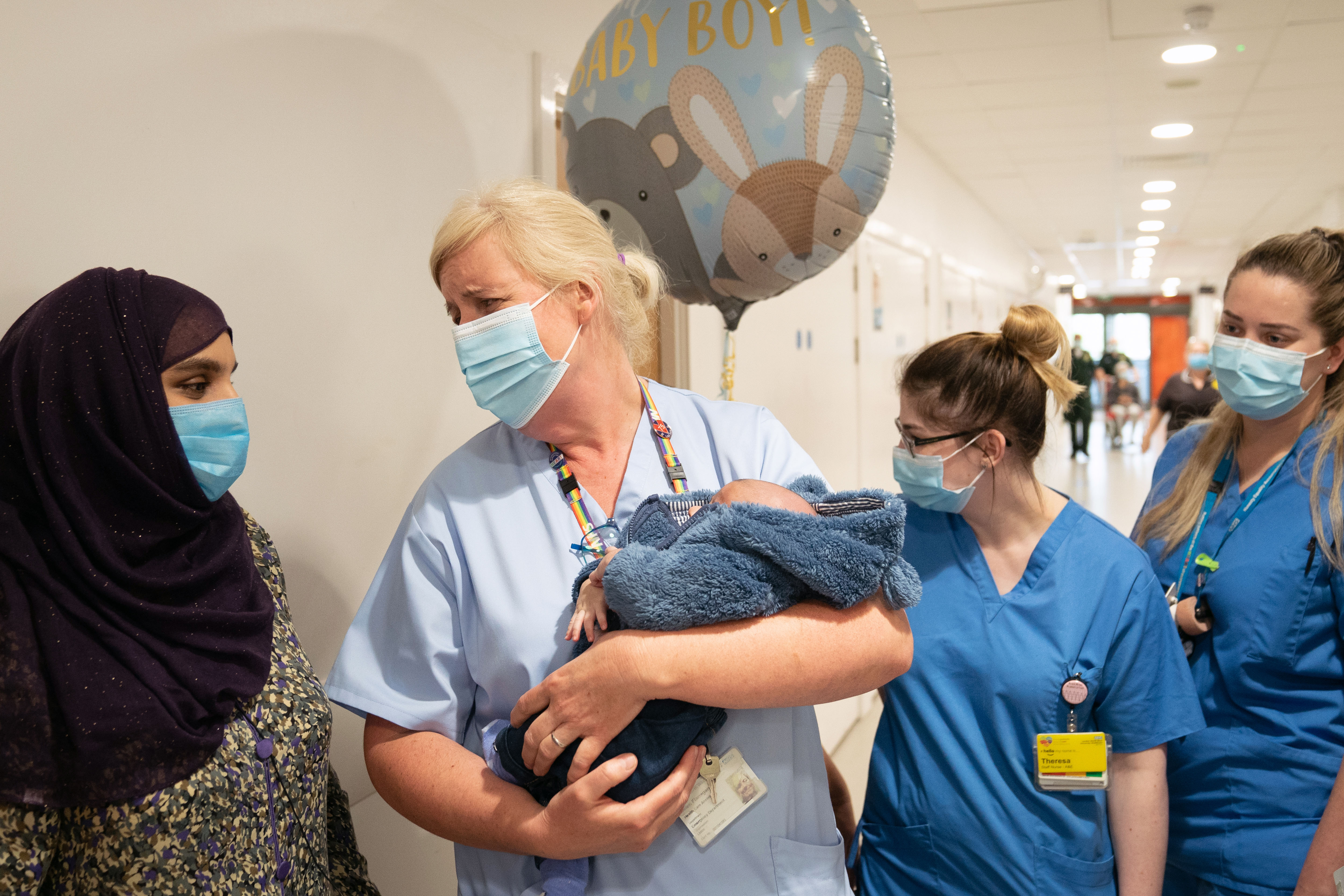 Woman with stomach ache who gave birth on hospital toilet with staff