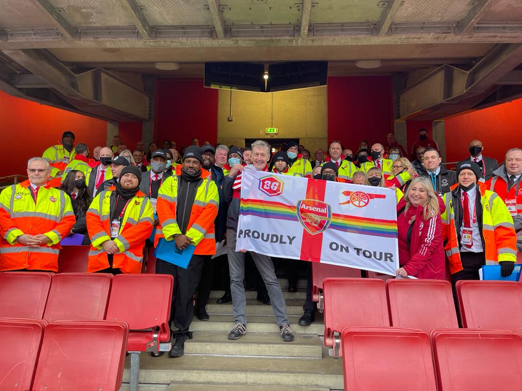 Carl Fearn (centre) is the co-chair of Gay Gooners, Arsenal's LGBT+ supporters group. 