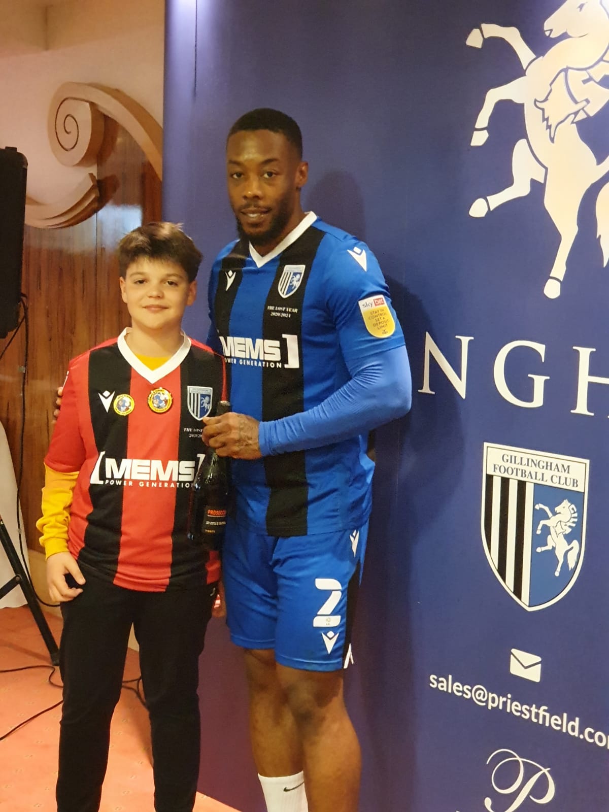 Ukrainian refugee Daniel Lysak with Gillingham player Ryan Jackson