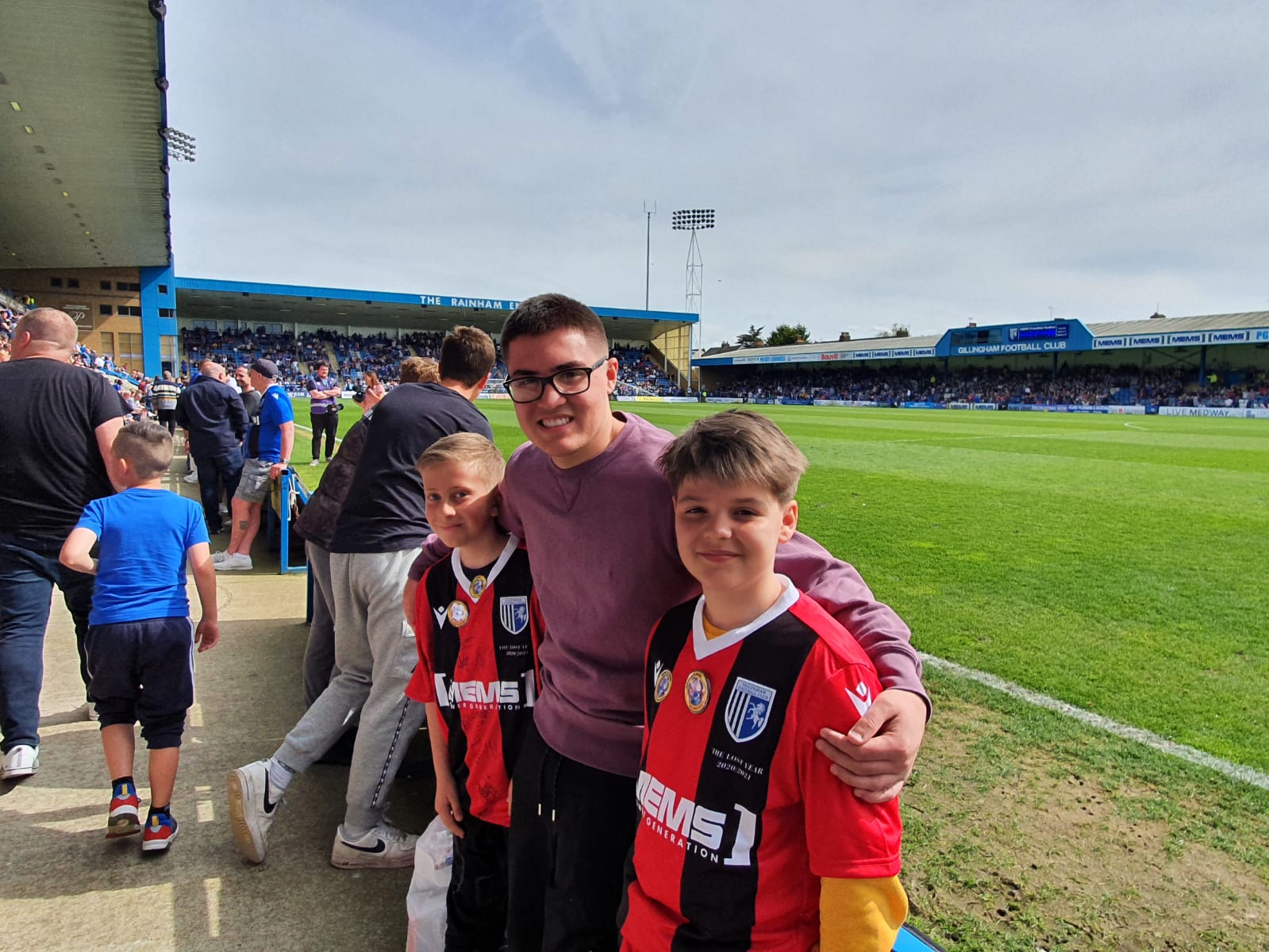 Daniel Lysak with Malcolm Bell's two sons Freddie (left) and Joseph (centre)