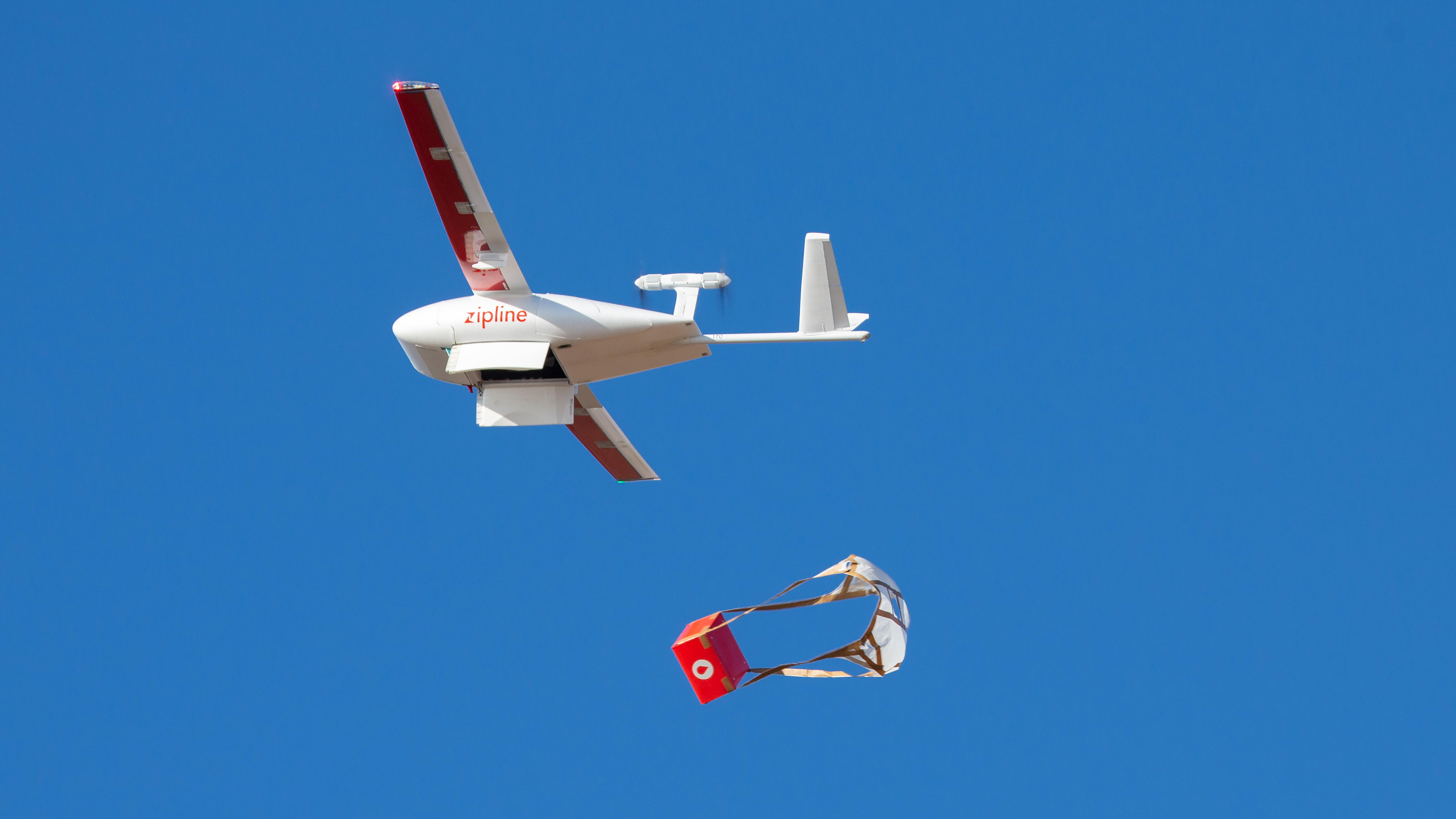A drone makes a package drop during a demonstration at Zipline's Northern California hub in 2021