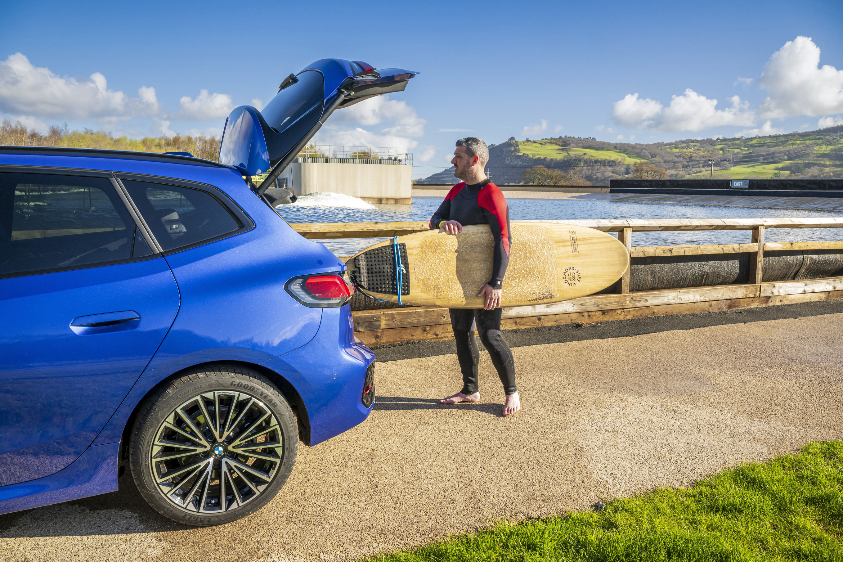 Man fulfilling his ambition of learning to surf, one of the nation's top ambitions in a poll conducted by BMW