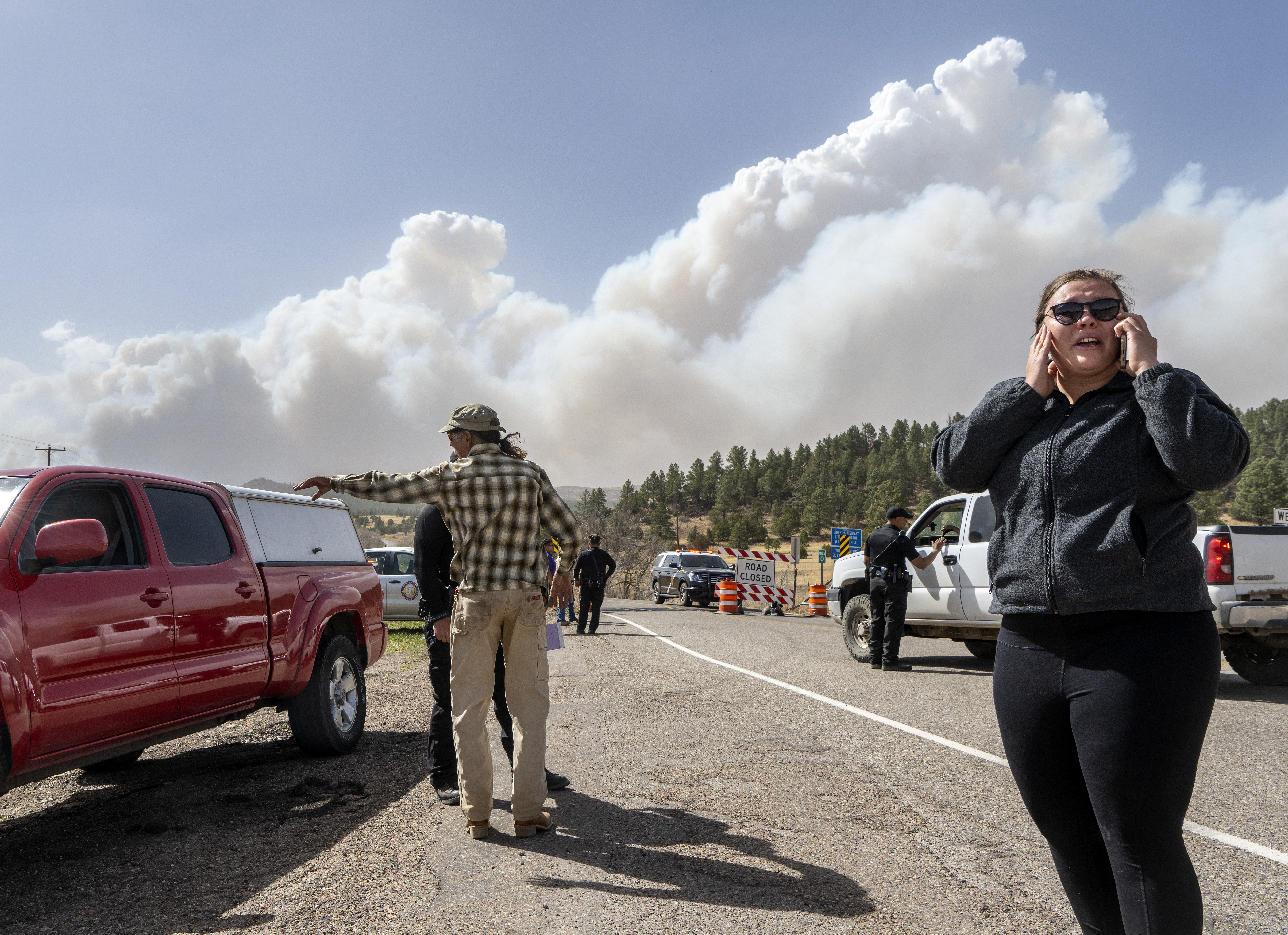 People flee wildfires