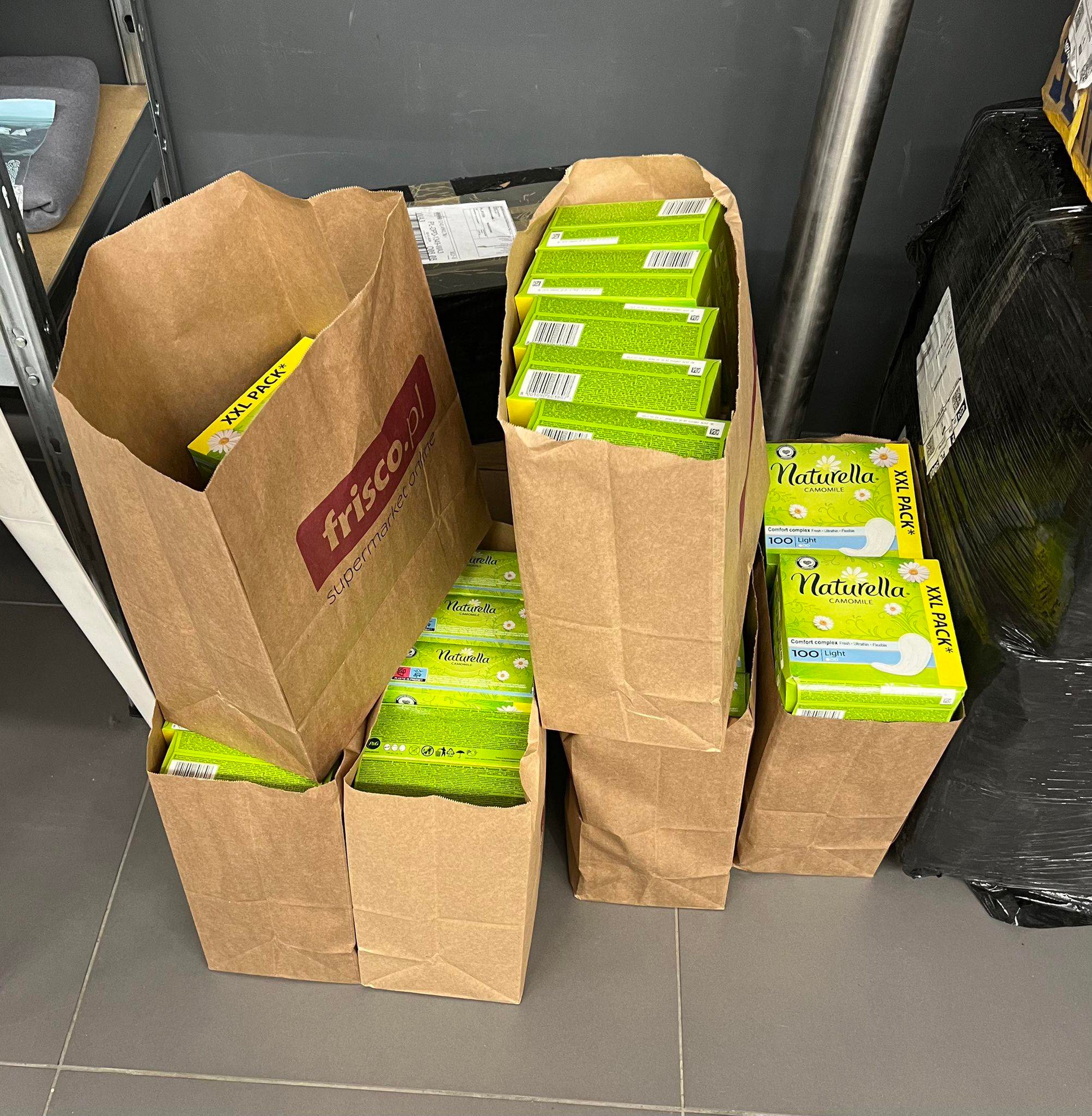 Sanitary products being handed out in Warsaw refugee camps by British student Ella Lambert and her team (Ella Lambert/PA)