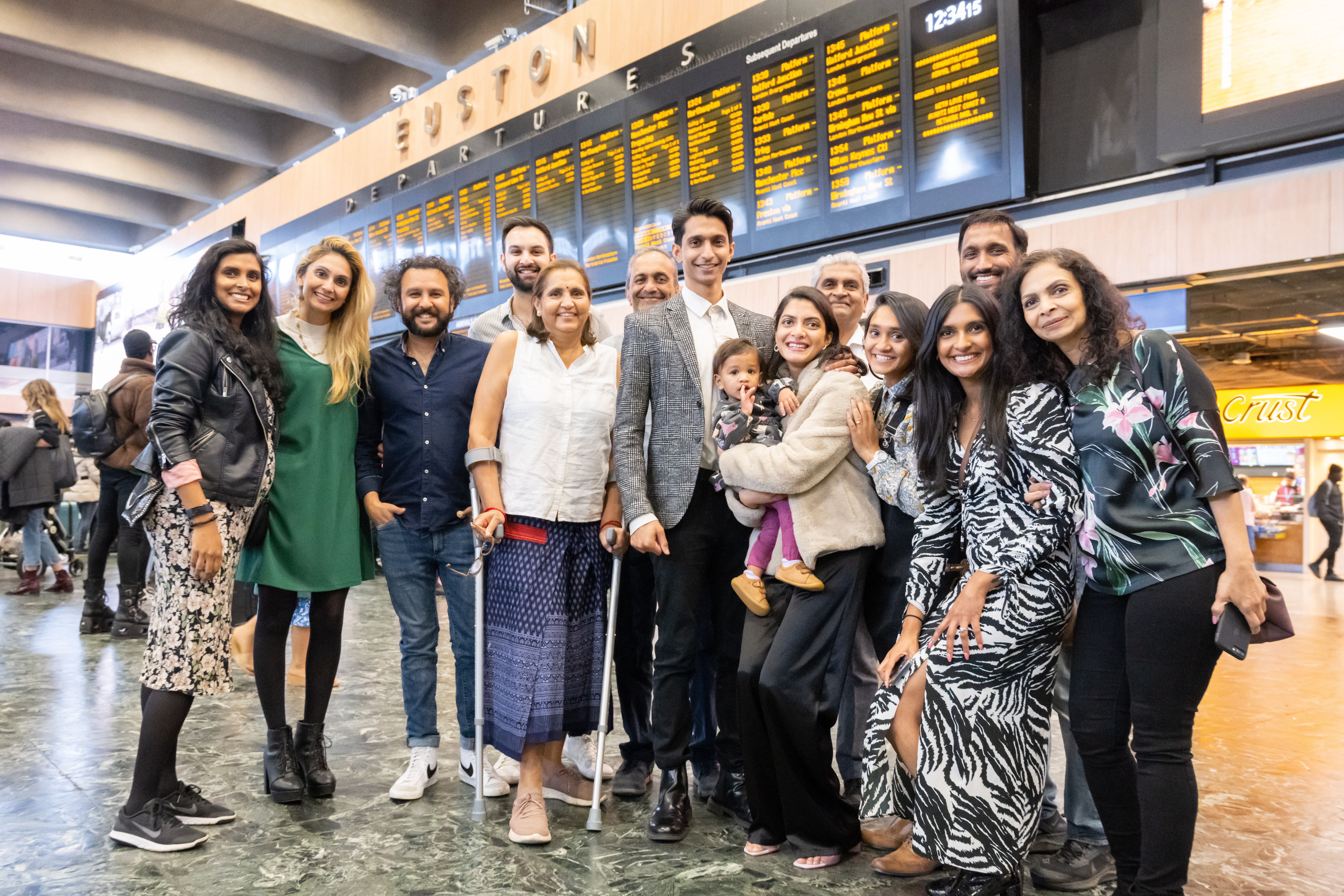 Nirmal Chohan and Vidya Patel with their family at Euston station