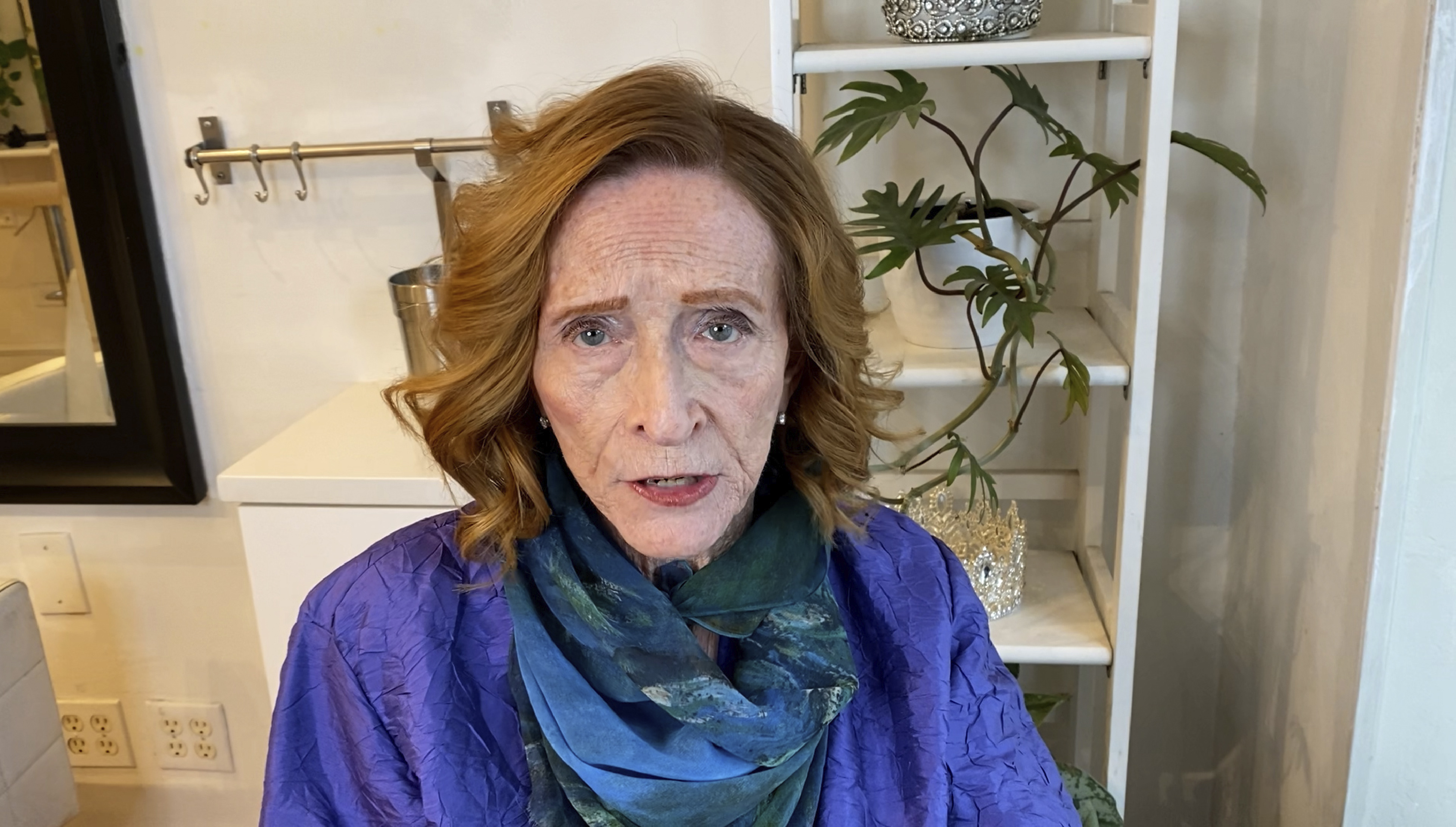 Ginger Lane, a Holocaust survivor, participates in the video