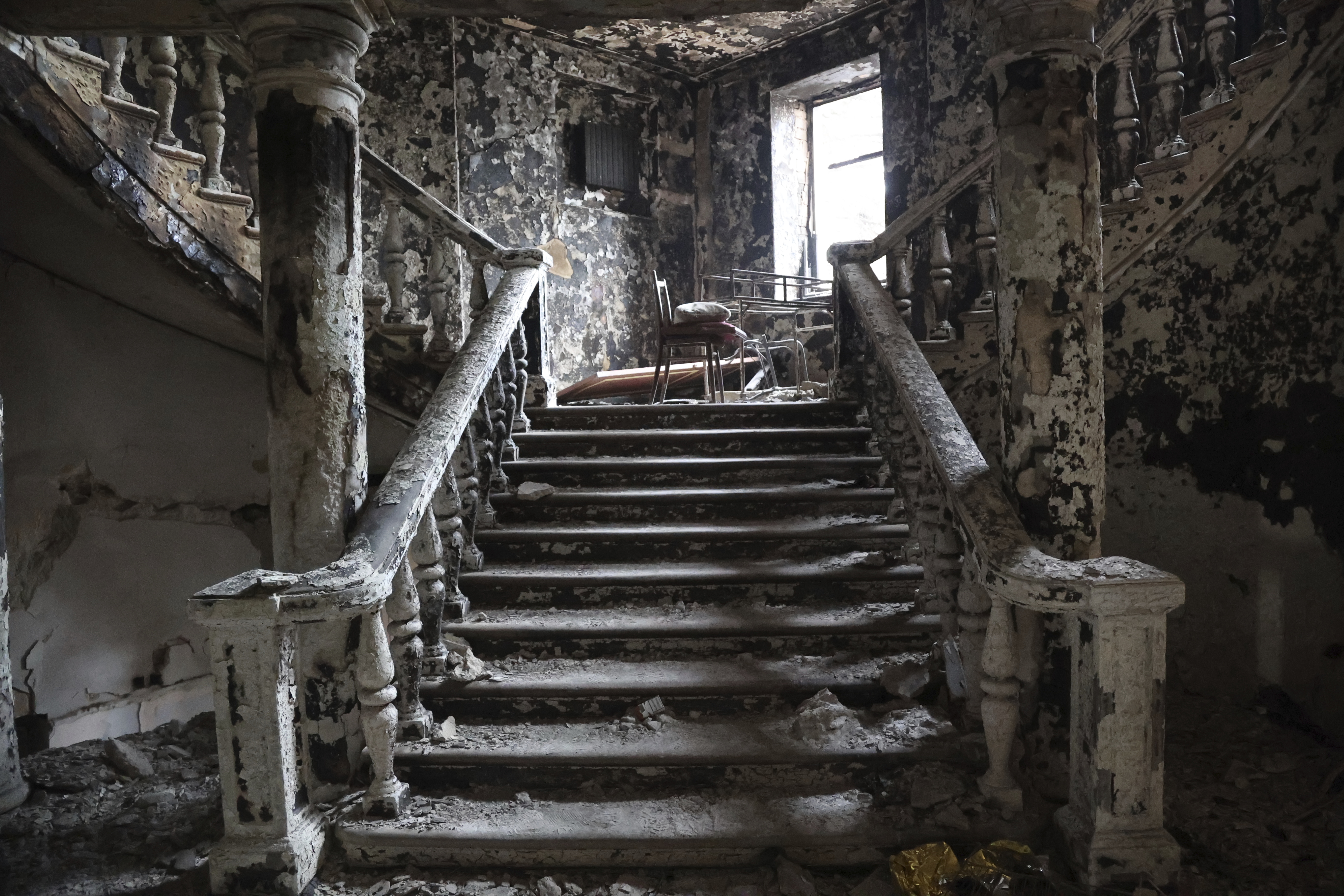 Debris covers the inside of the theatre