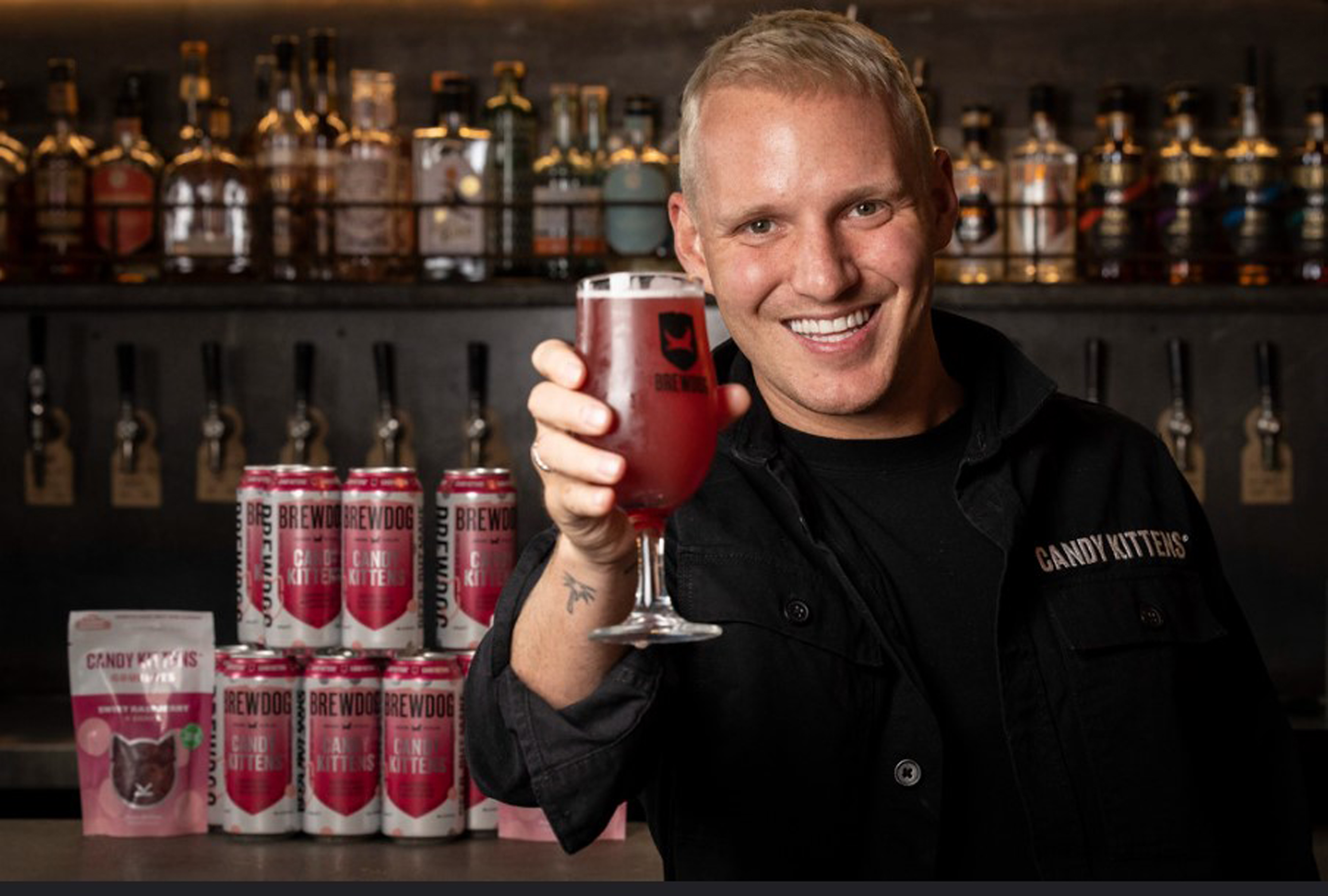 Jamie Laing with the pink beer