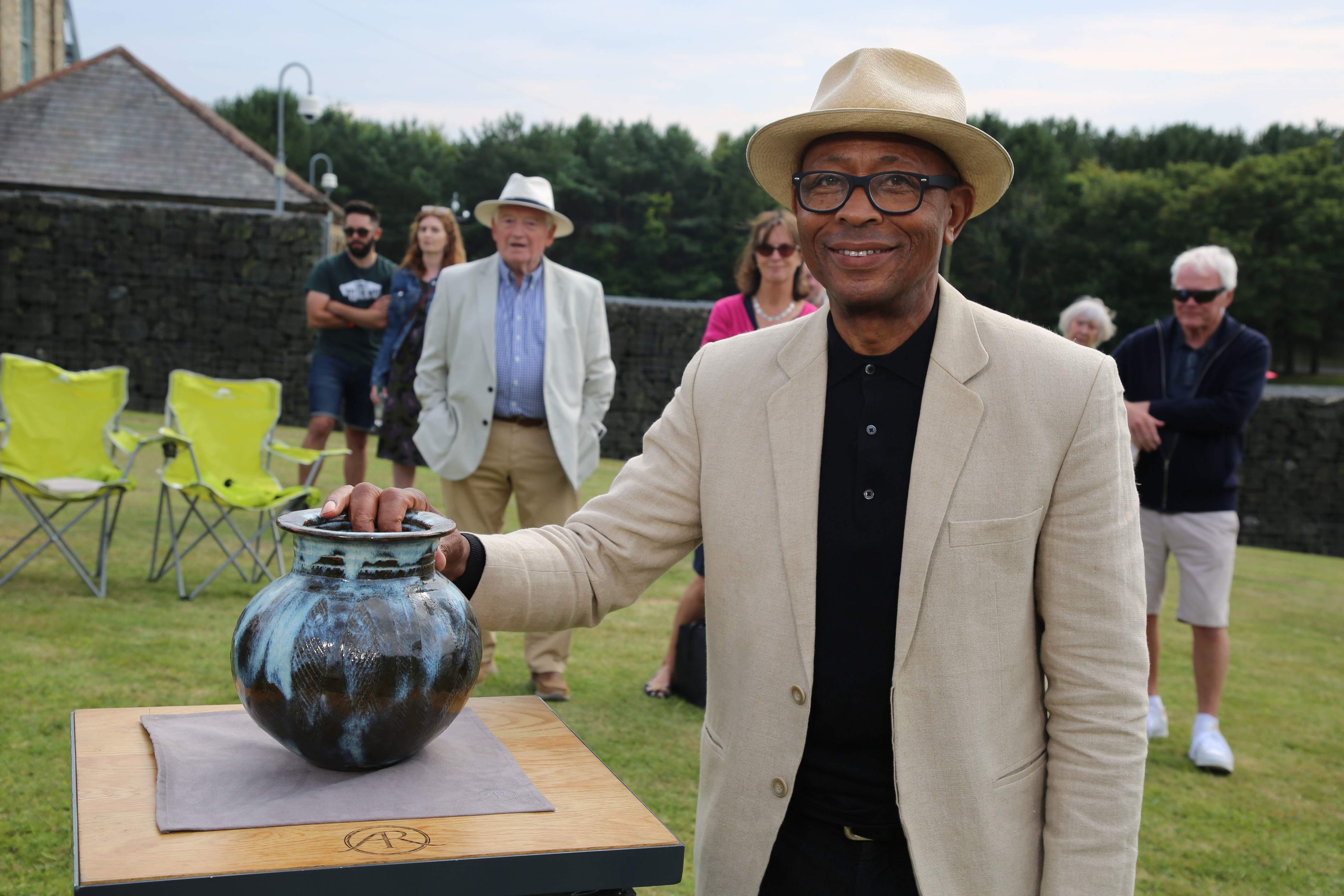 Archer-Morgan on the Antiques Roadshow with a ceramic pot