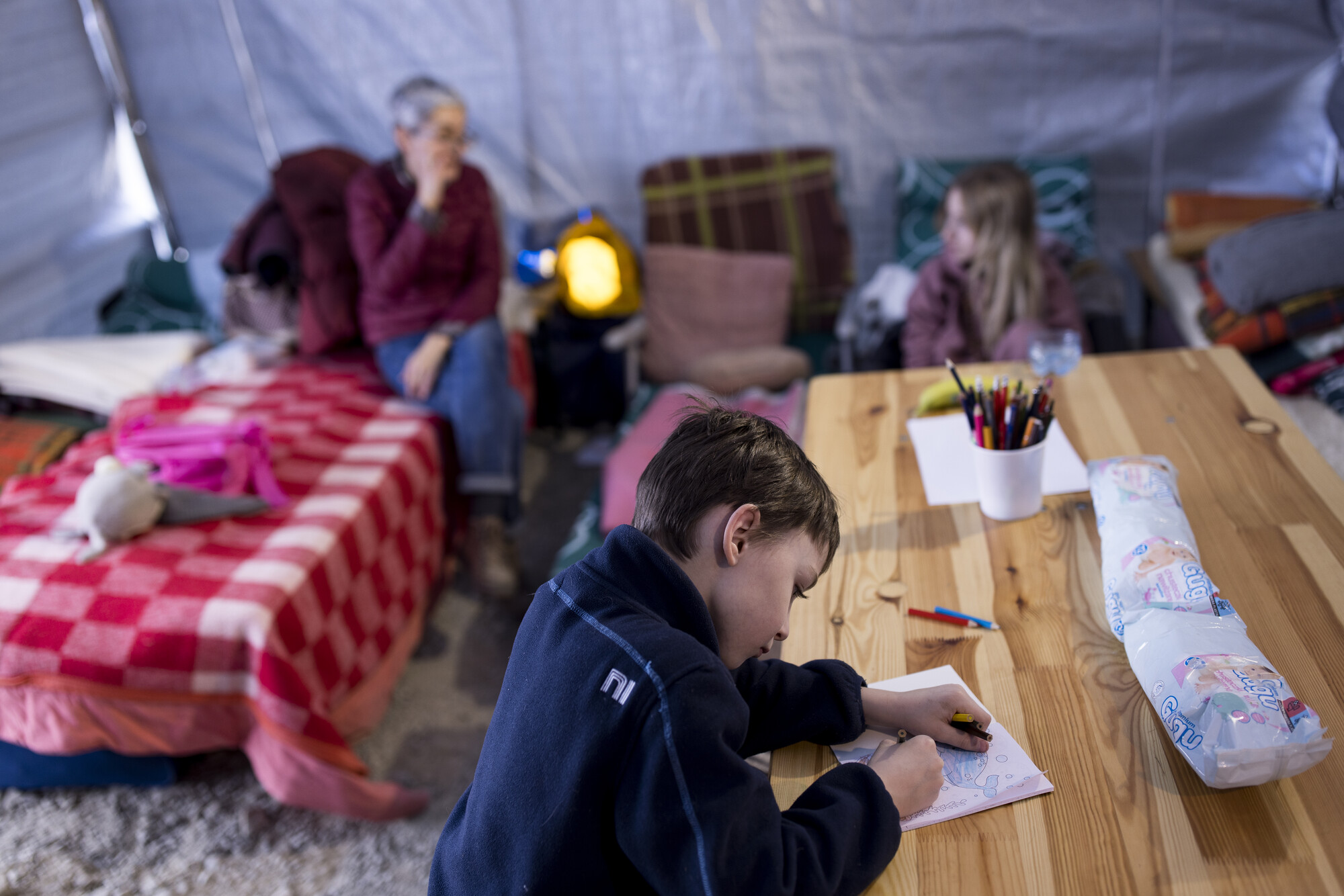 Ukraine refugees receives support at the Caritas tent