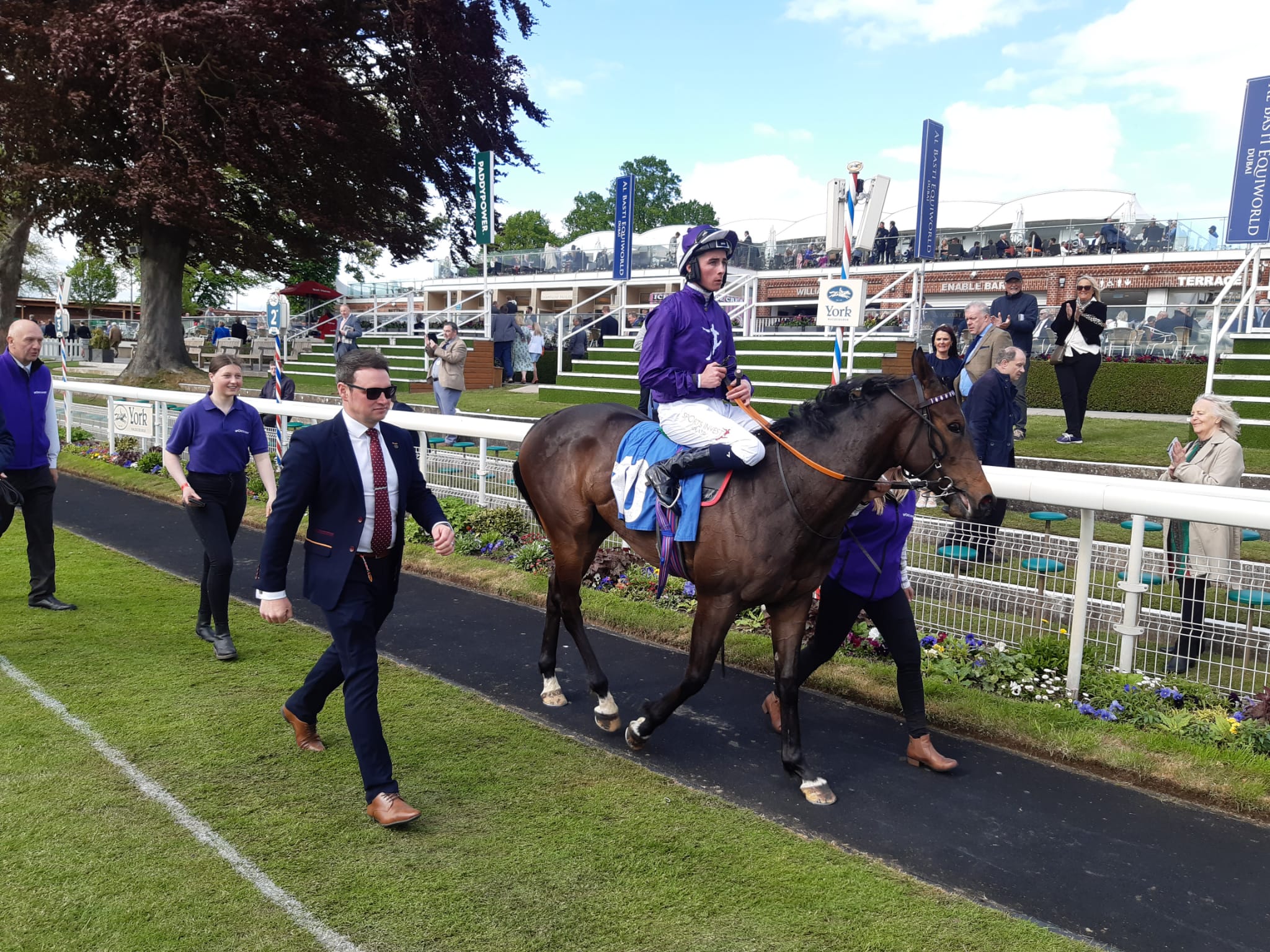 Queen Olly returns to the winner's enclosure at York (