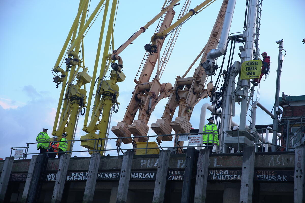 Greenpeace climbers block a tanker carrying 33,000 tonnes of Russian diesel to the UK at Navigator Terminals in Essex