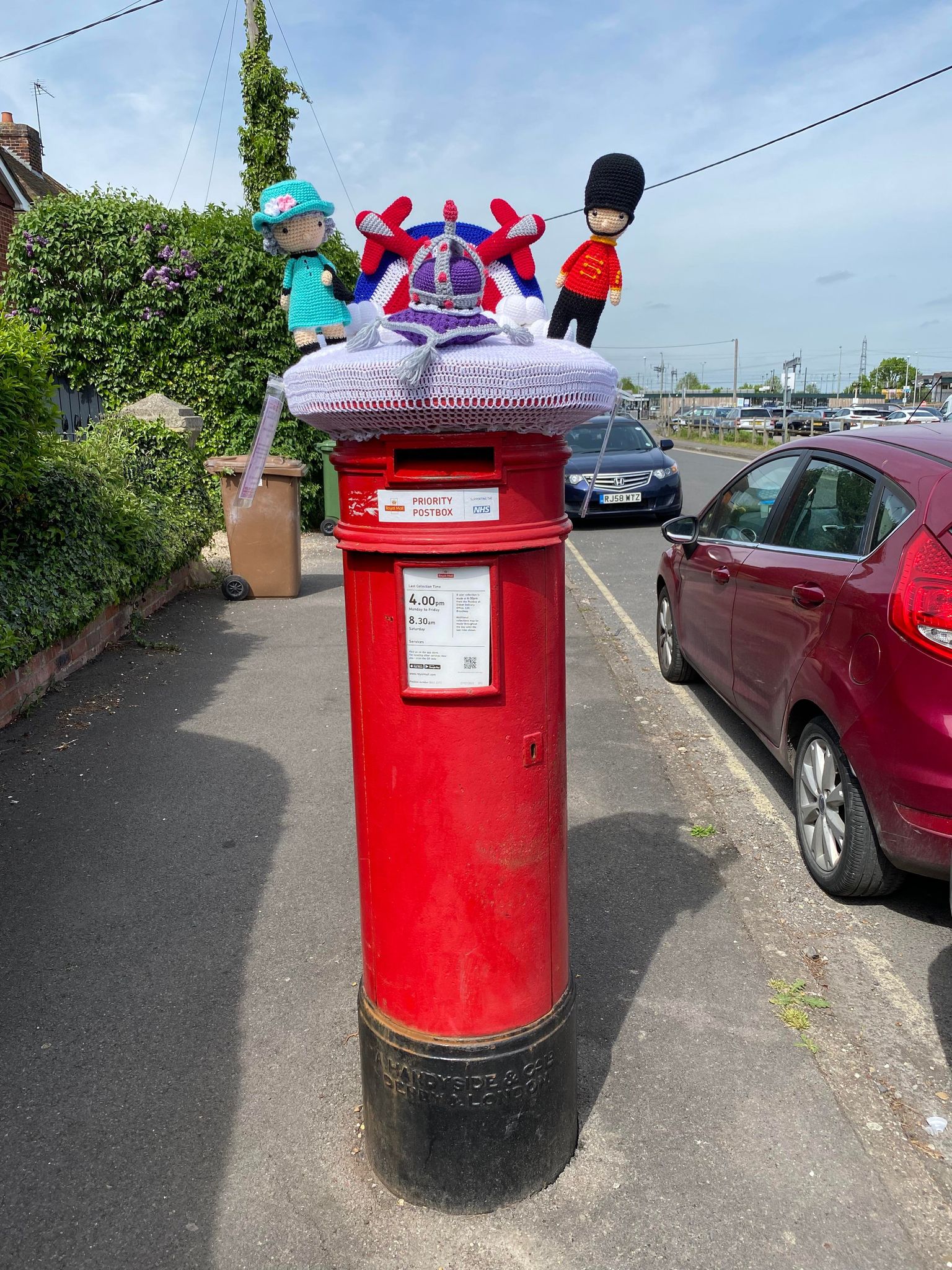 Crafters pick up crochet hooks to decorate post boxes ahead of Queen’s