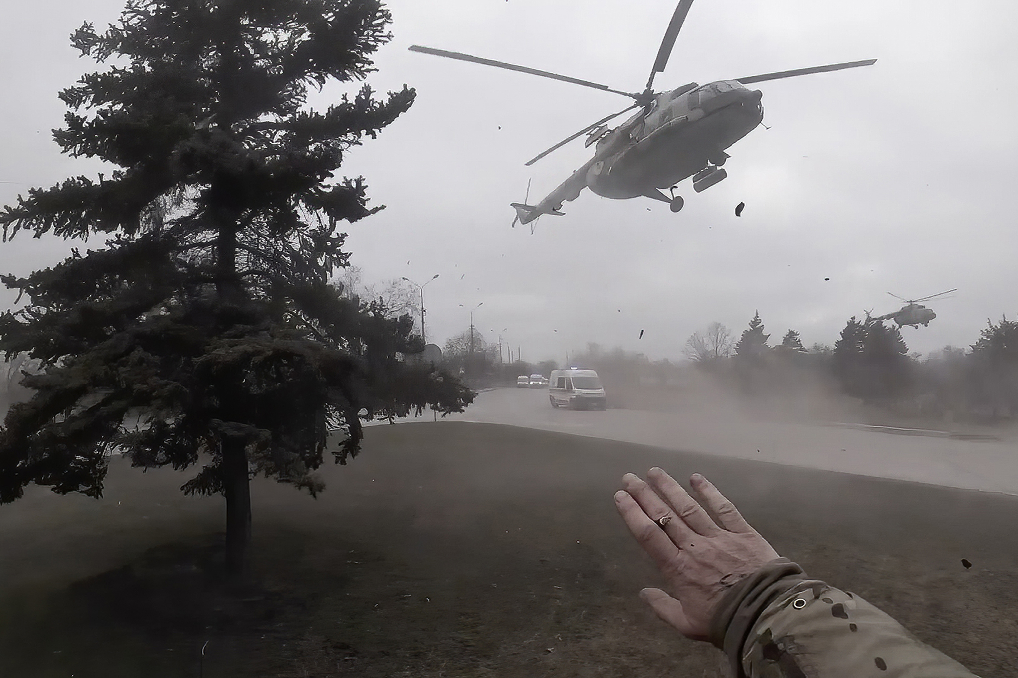 A Ukrainian medical evacuation helicopter lands in front of Yuliia Paievska, known as Taira, in Mariupol, Ukraine, on February 27
