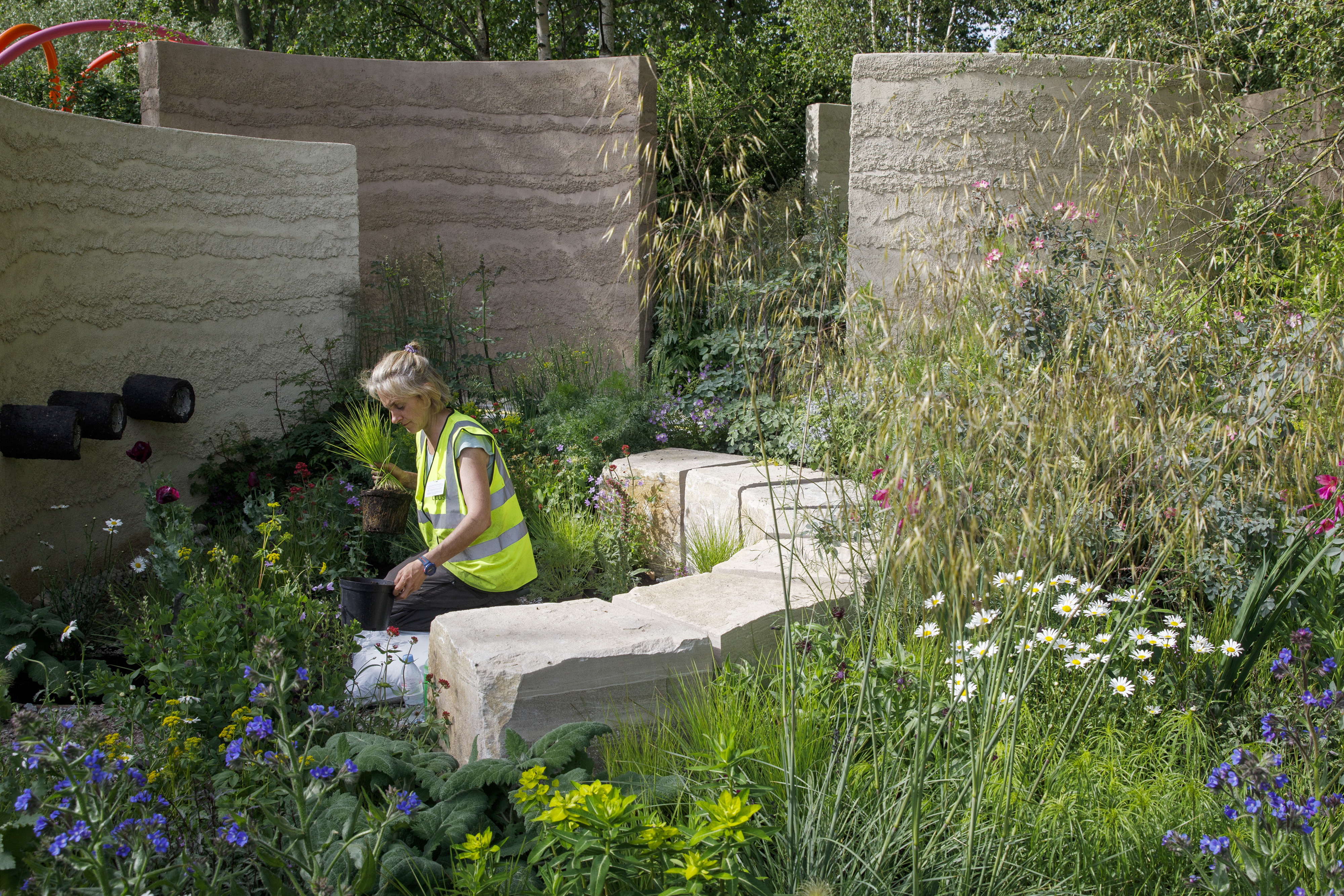 A member of the team works The Mind Garden designed by Andy Sturgeon during build up to the show