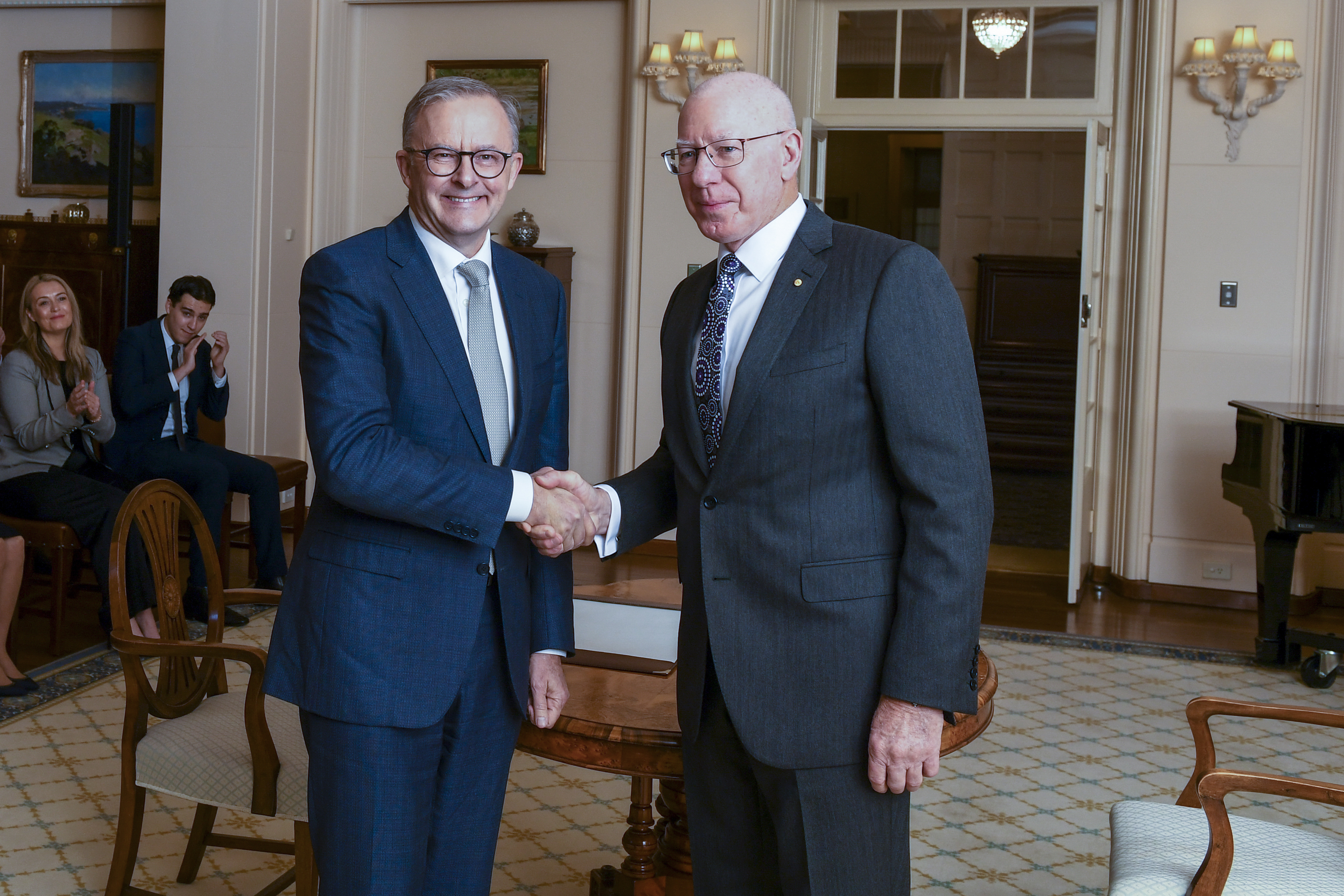 Australian Prime Minister Anthony Albanese, left, is congratulated by Australian Governor-General David Hurley after his swearing in ceremony at Government House in Canberra
