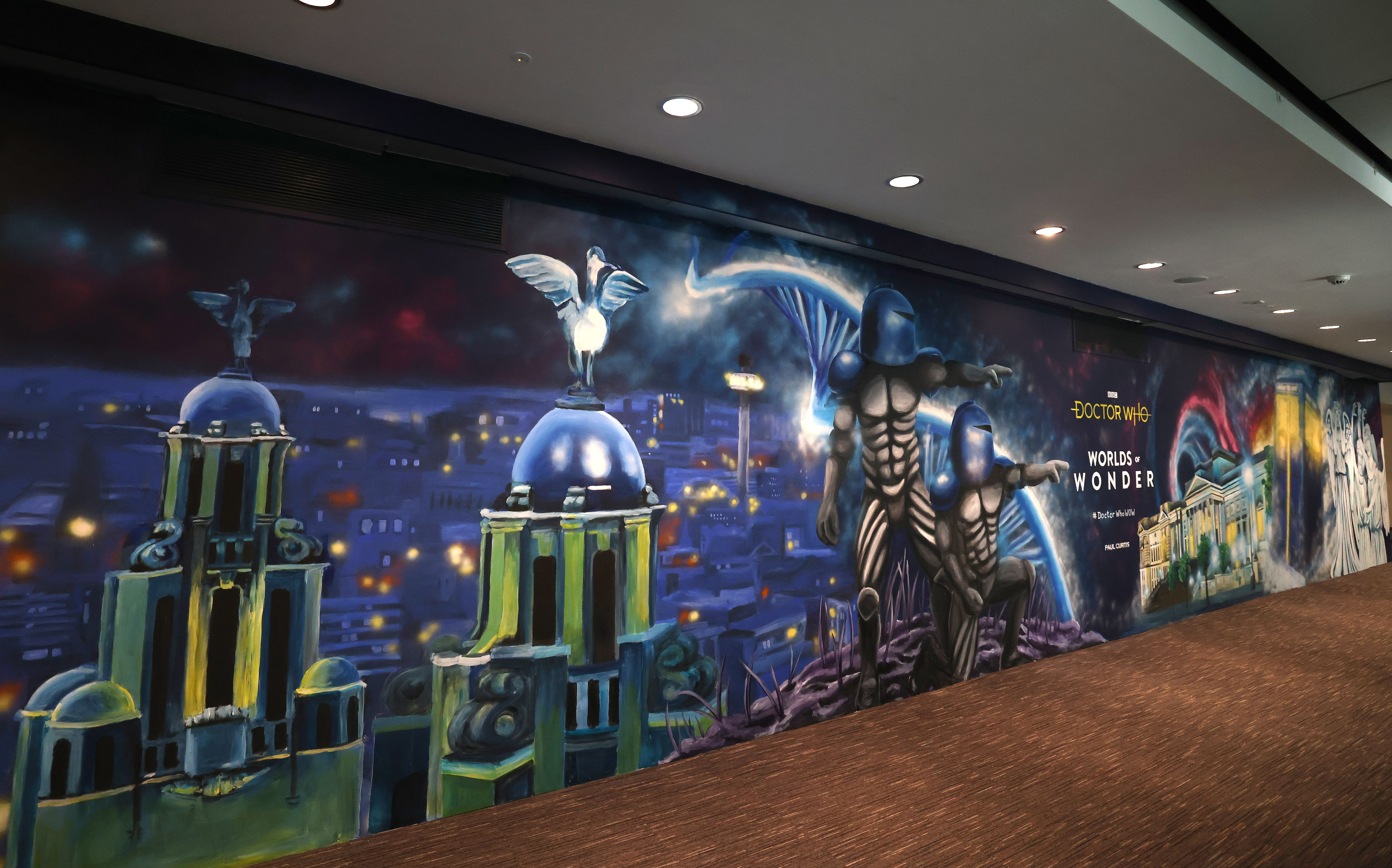 A mural by artist Paul Curtis at the Doctor Who Worlds of Wonder exhibition at World Museum Liverpool (Gareth Jones/PA)