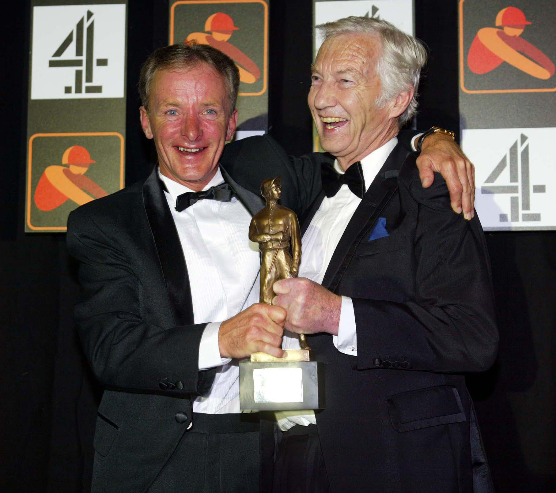 Lester Piggott presents Pat Eddery with his Lesters award in 2004 