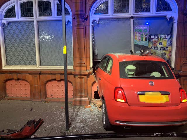 Two taken to hospital after car crashes into pub | Oxford Mail