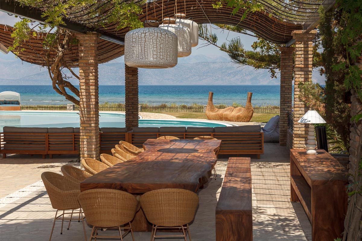 One of Apraos Beach House's outdoor dining areas