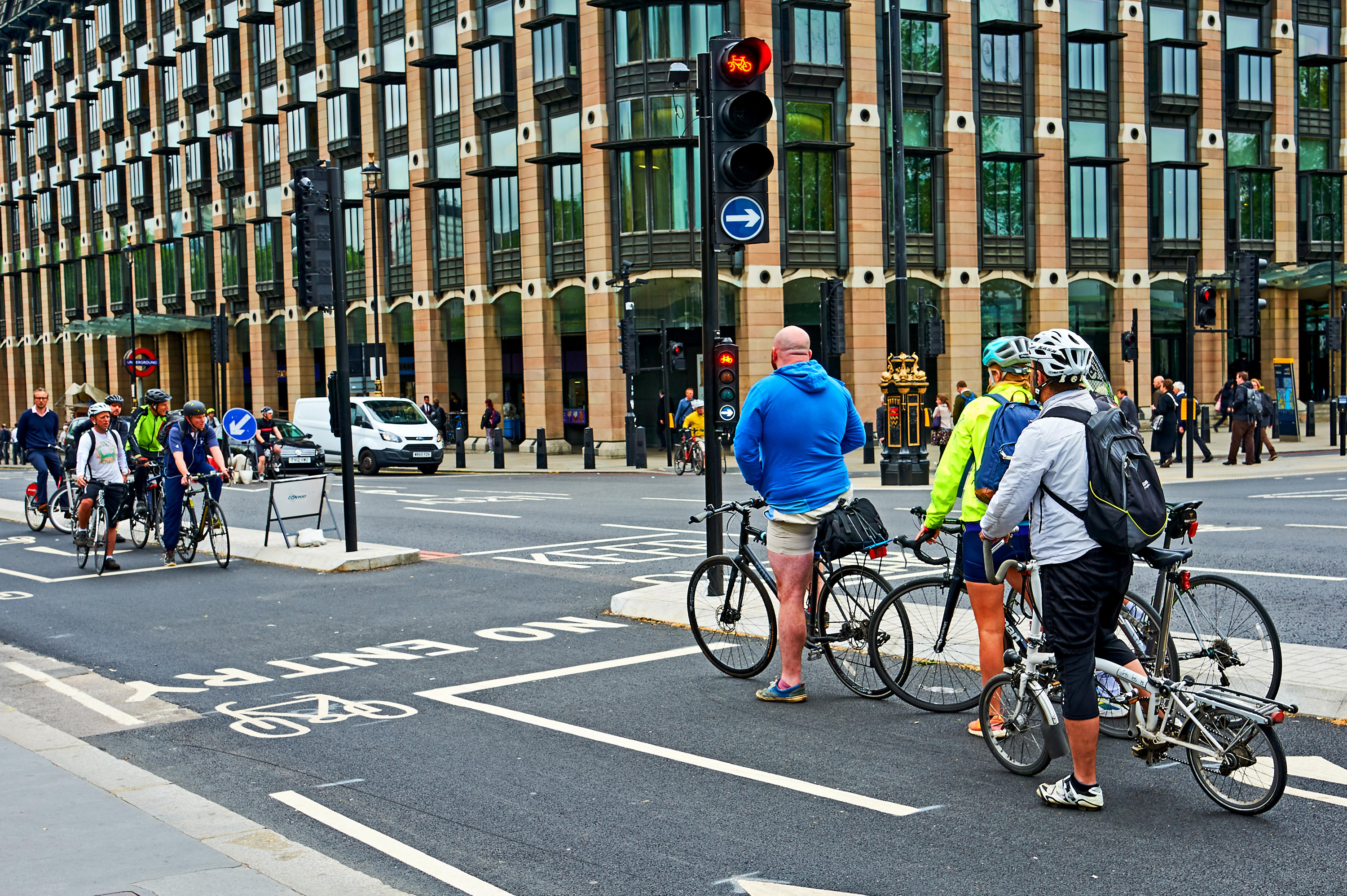  Commuters cycling to work on an urban street