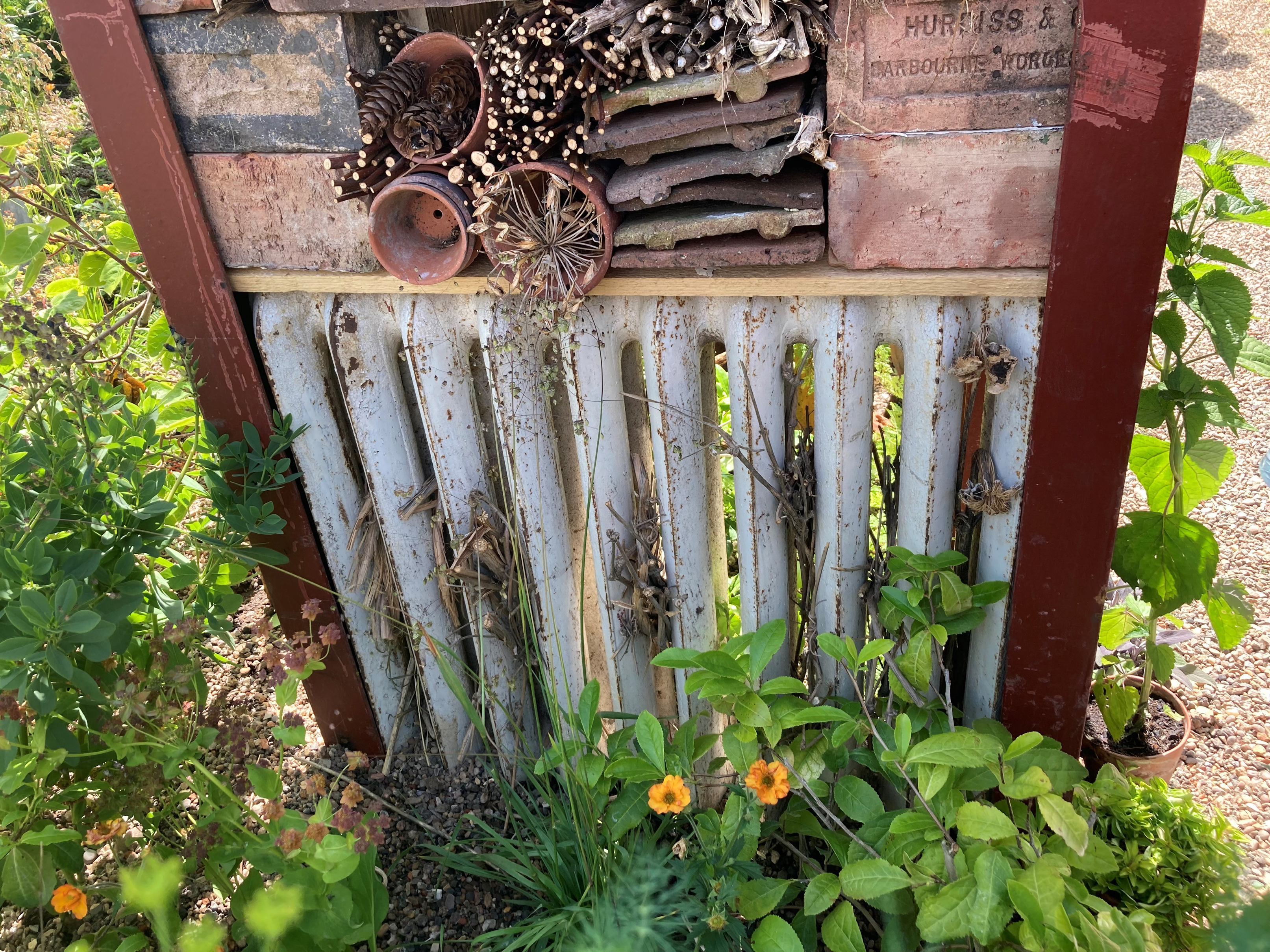 An old radiator adapted into a bug hotel (Hannah Stephenson/PA)