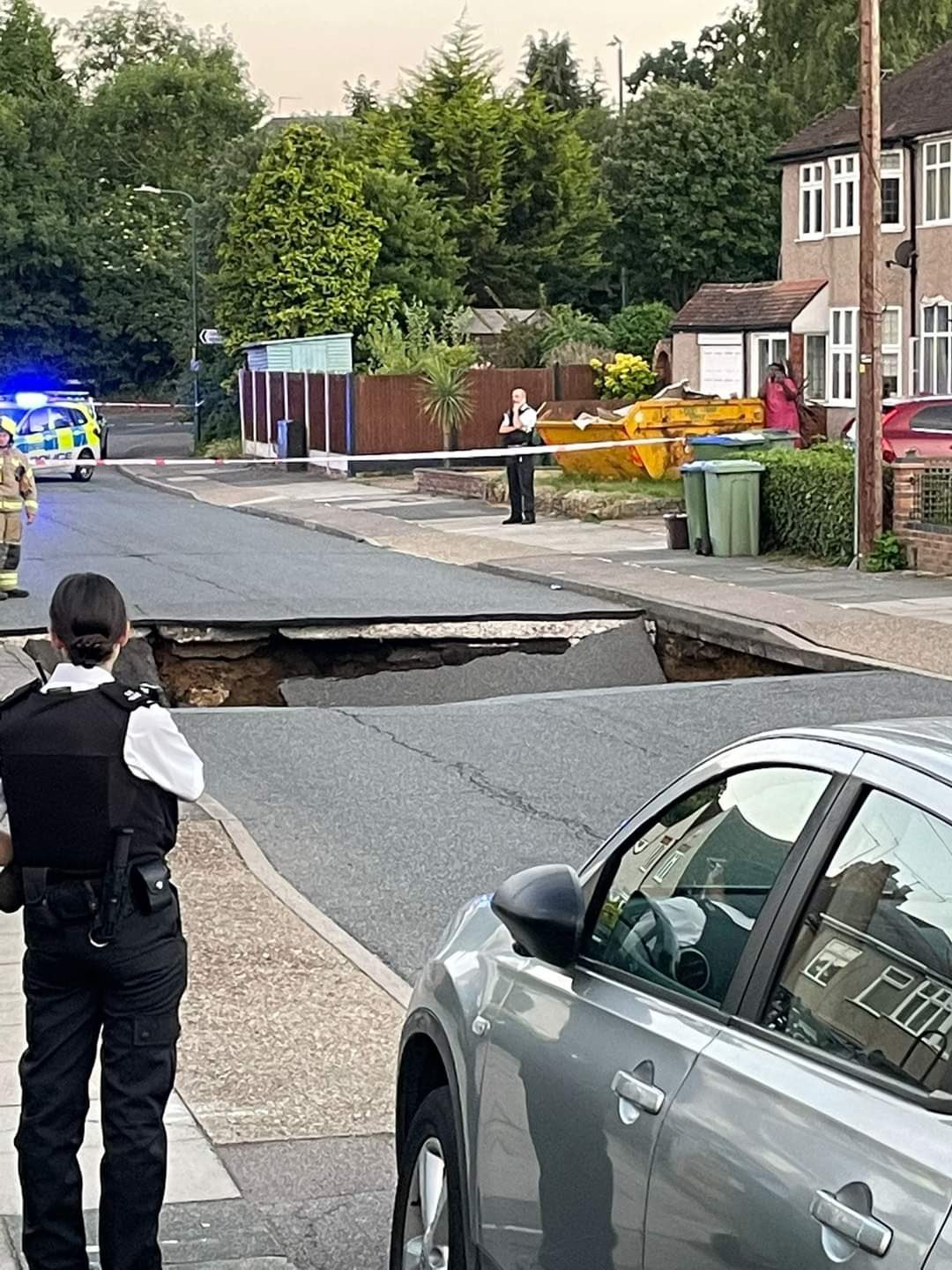 Liam Edwards, 25, who lives on Leysdown Avenue, said he heard a "massive thud" as part of the road next to his collapsed. 