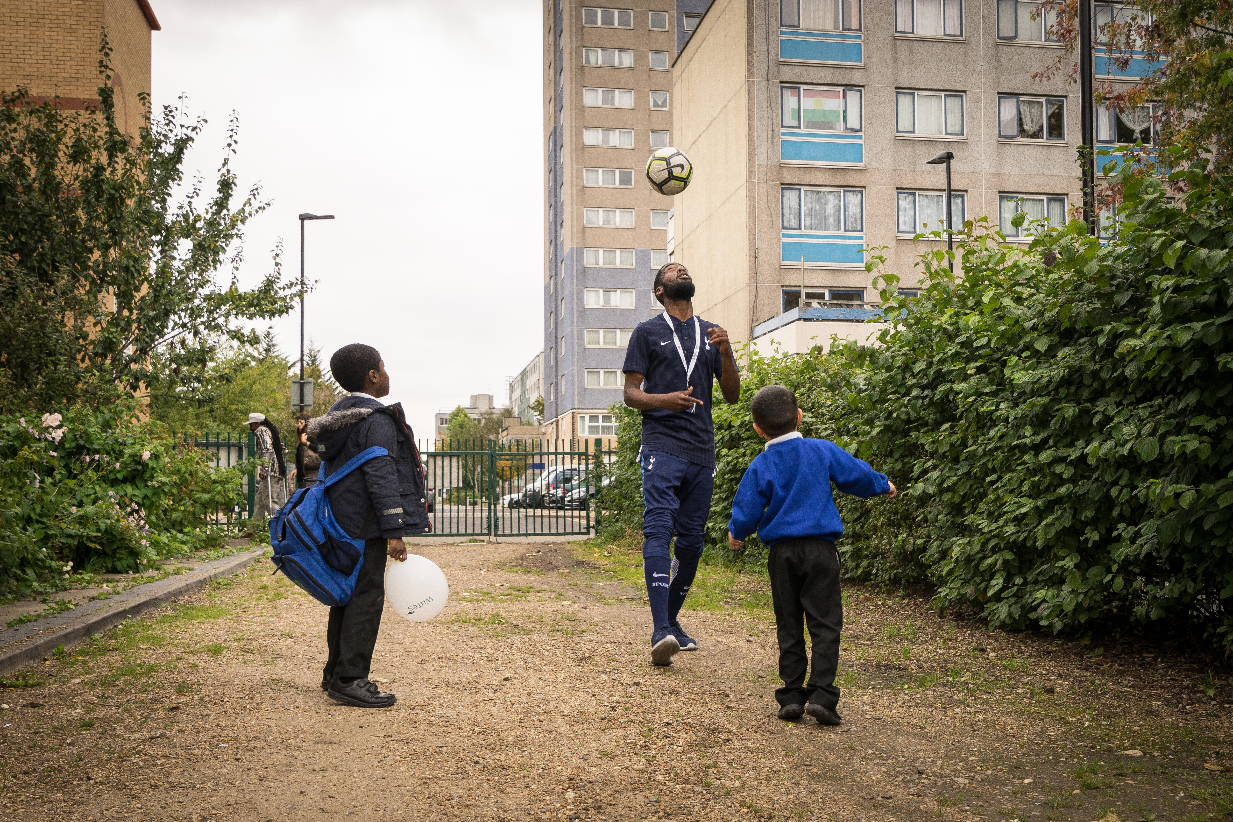 Children playing football at the Keepmoat Regeneration community event, London Borough of Haringey, London UK 