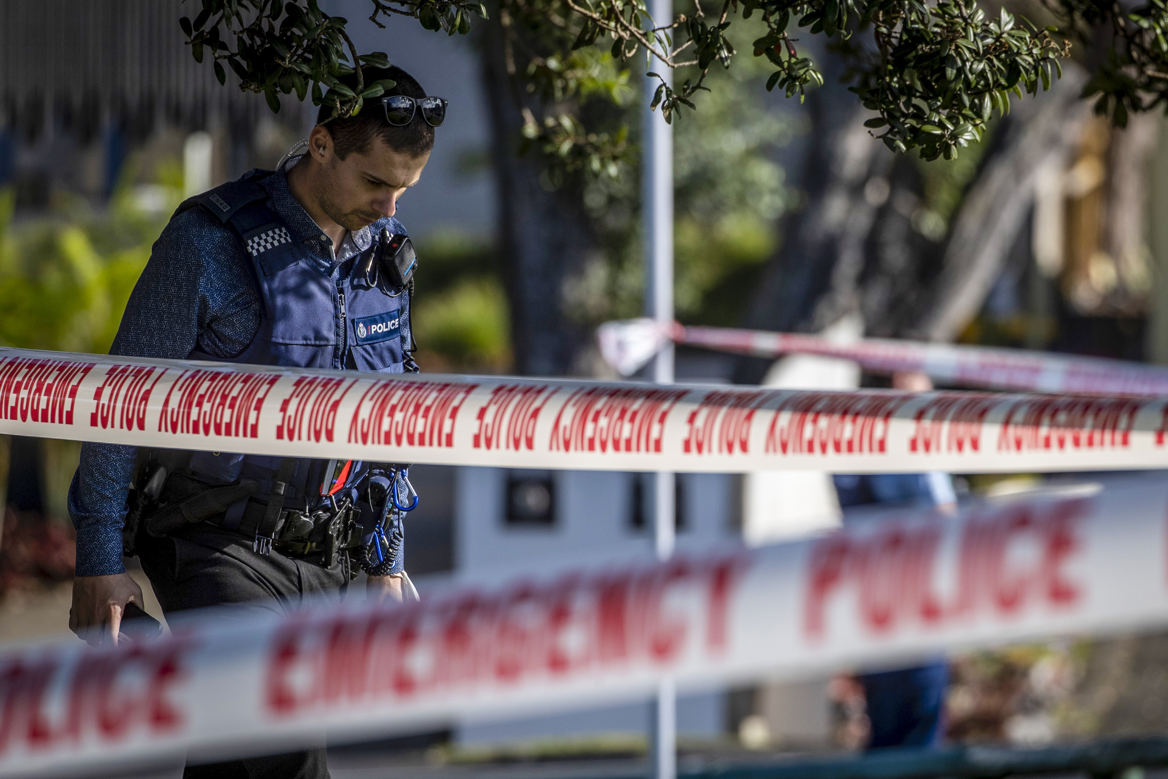 Police set up a cordon and search area in a suburb of Auckland following reports of multiple stabbings