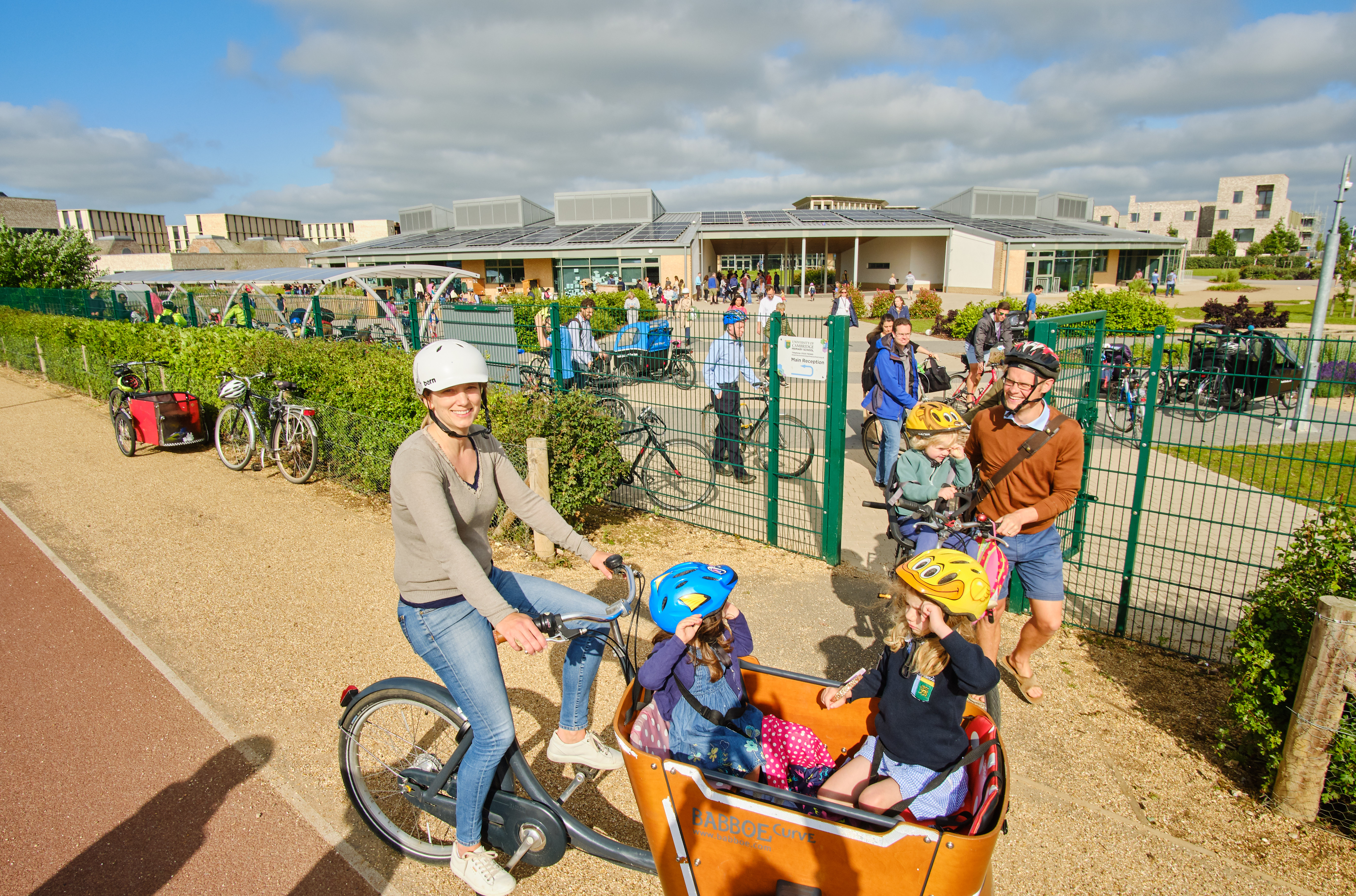 Eddington's primary school with parents and pupils using bikes (photojB/Sustrans/PA)