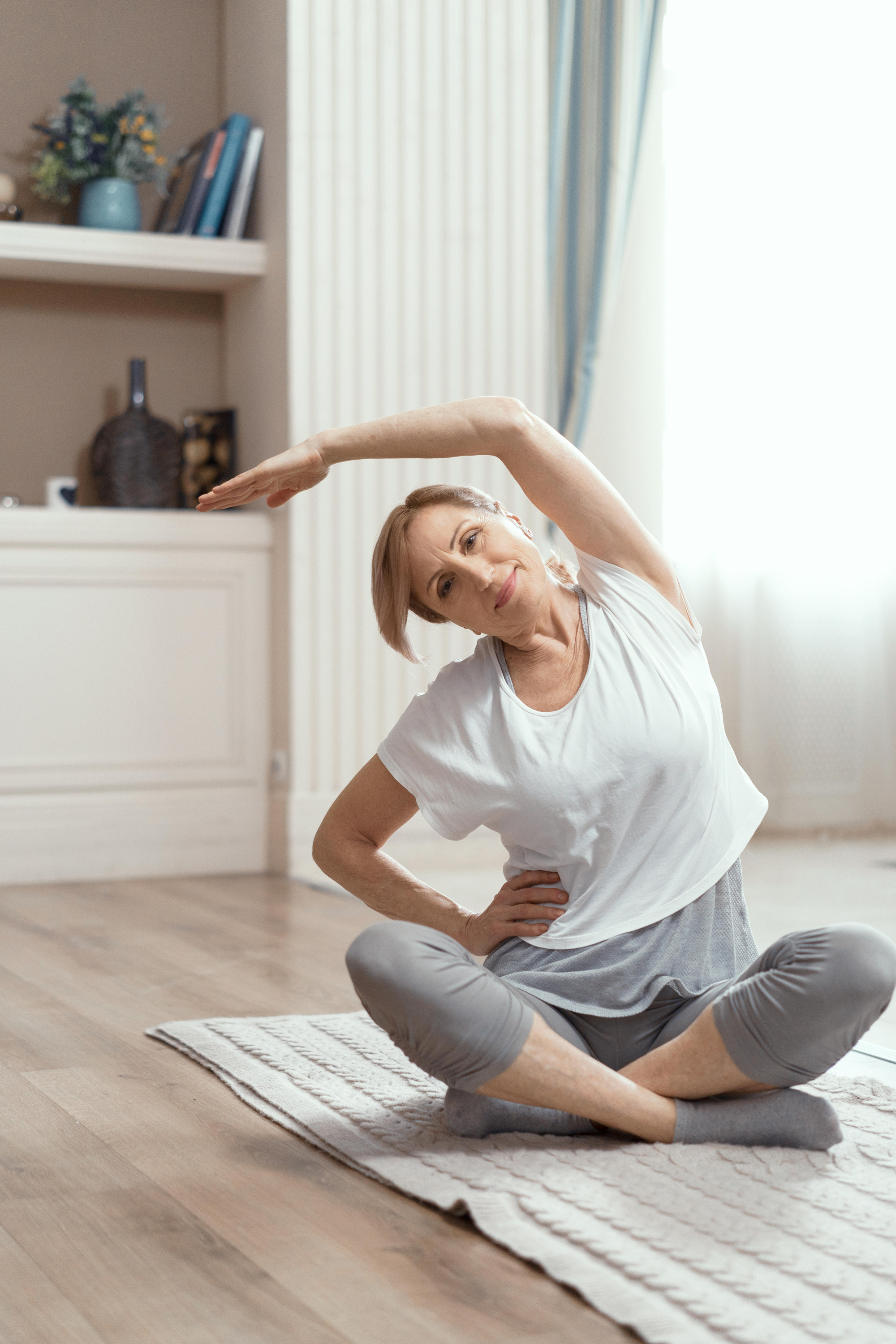 woman doing yoga at home