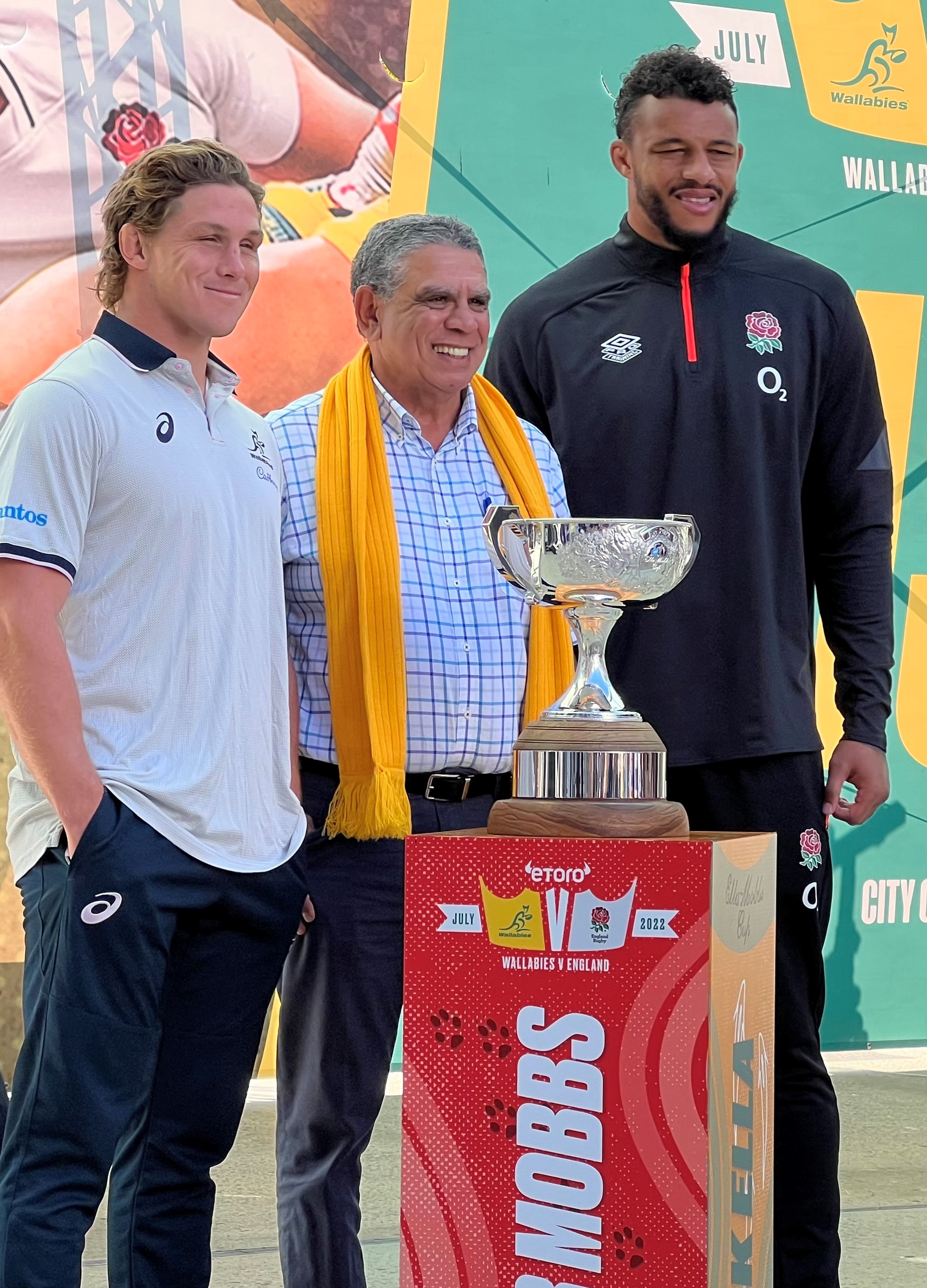 Australia captain Michael Hooper, Mark Ella and Courtney Lawes stand with the Ella-Mobbs Cup at its unveiling in Perth