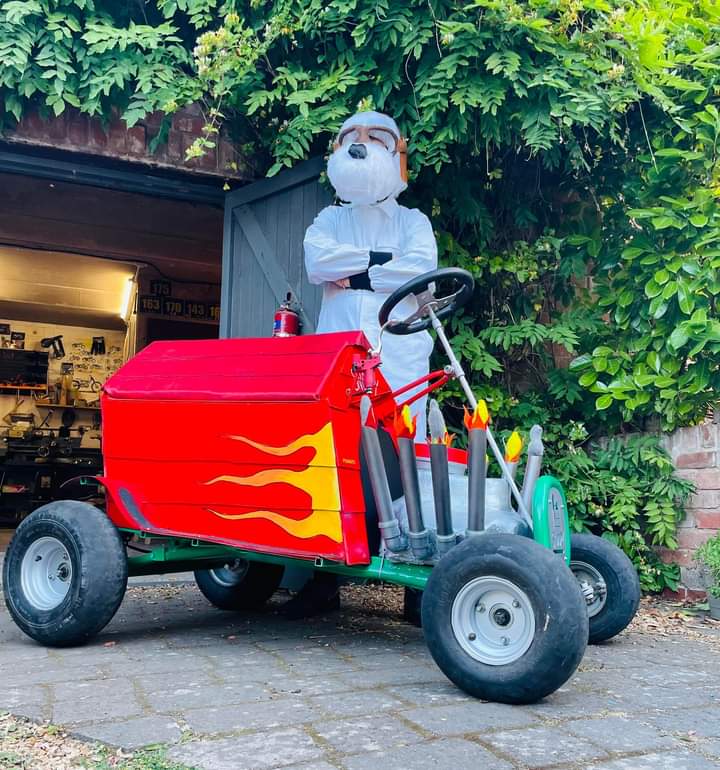 Team Peanuts' soapbox will feature Snoopy's famous red dog house and the driver will sit on the roof, 