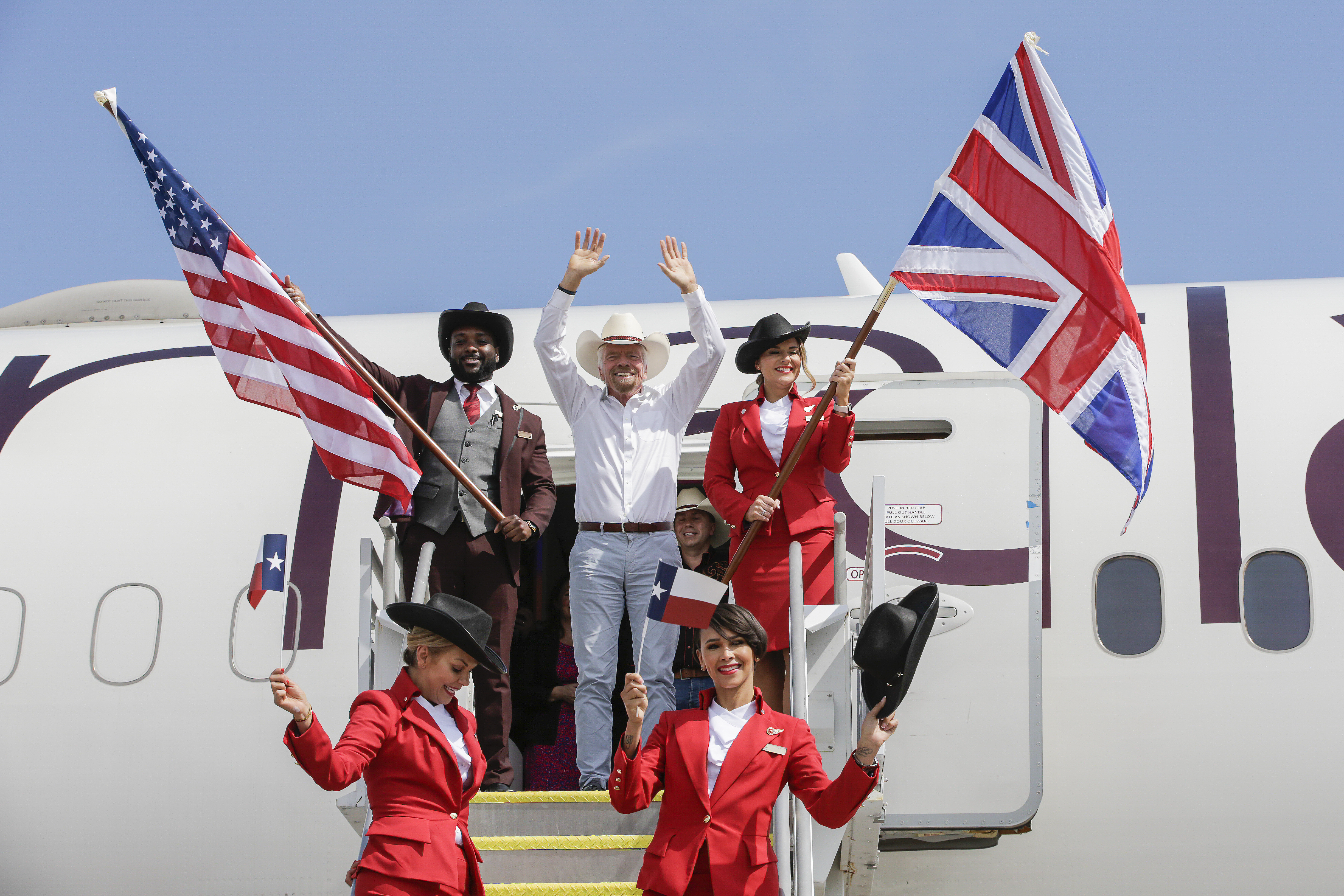 Richard Branson celebrates to launch of a new Virgin Atlantic flight to Austin (Virgin/PA)
