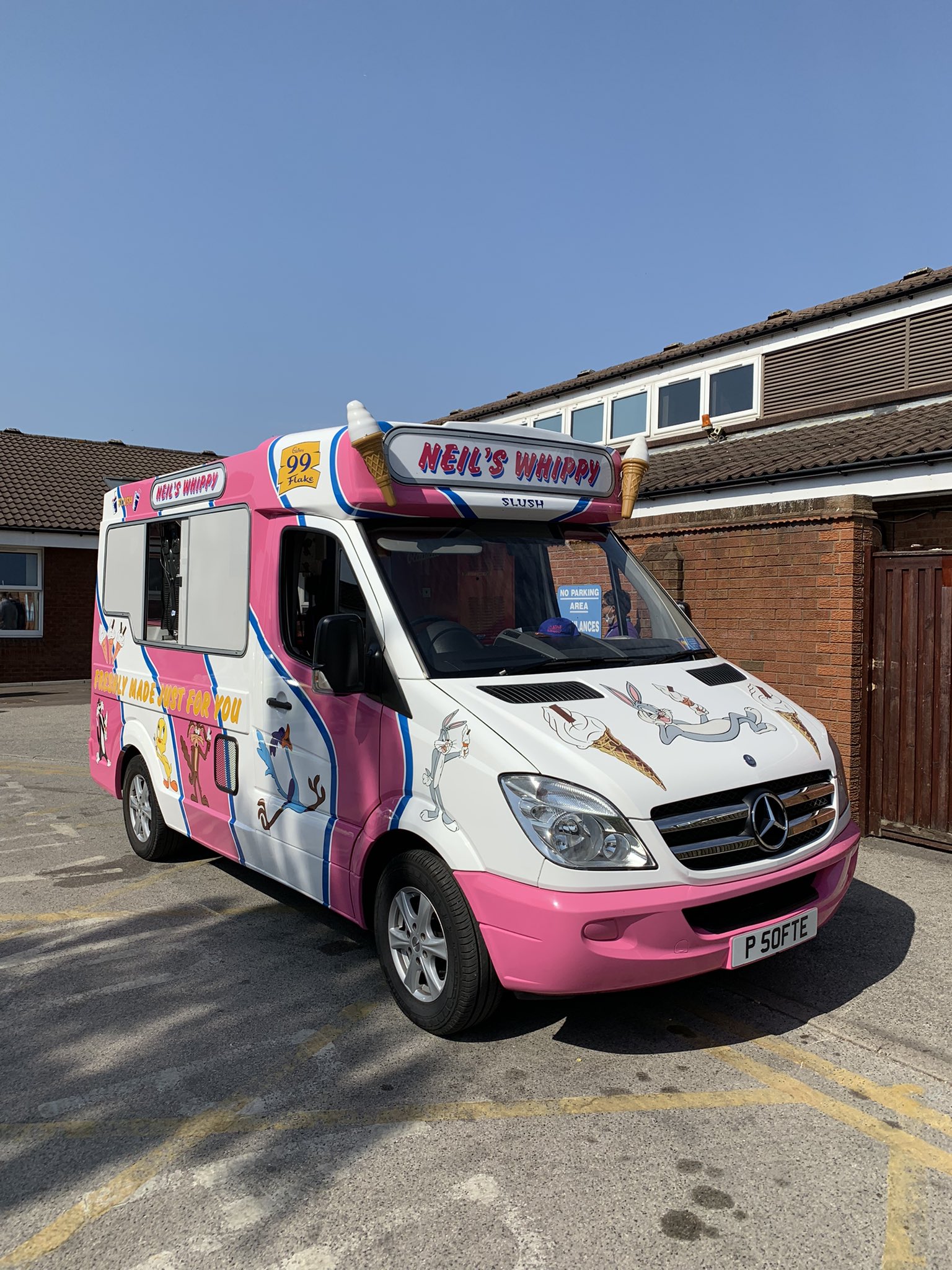 Pink and white ice cream van