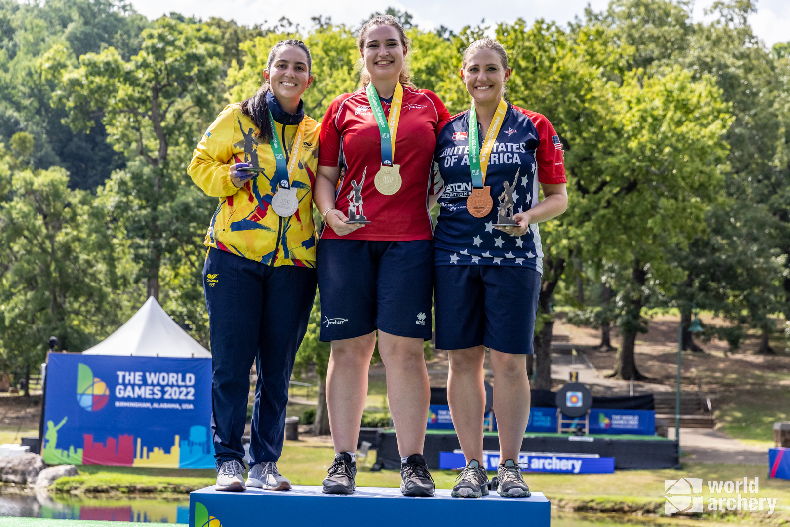 Ella Gibson, centre, took the world number one spot from Colombia's Sara Lopez, left, at the World Games in Alabama, where American Paige Pearce, right, claimed bronze