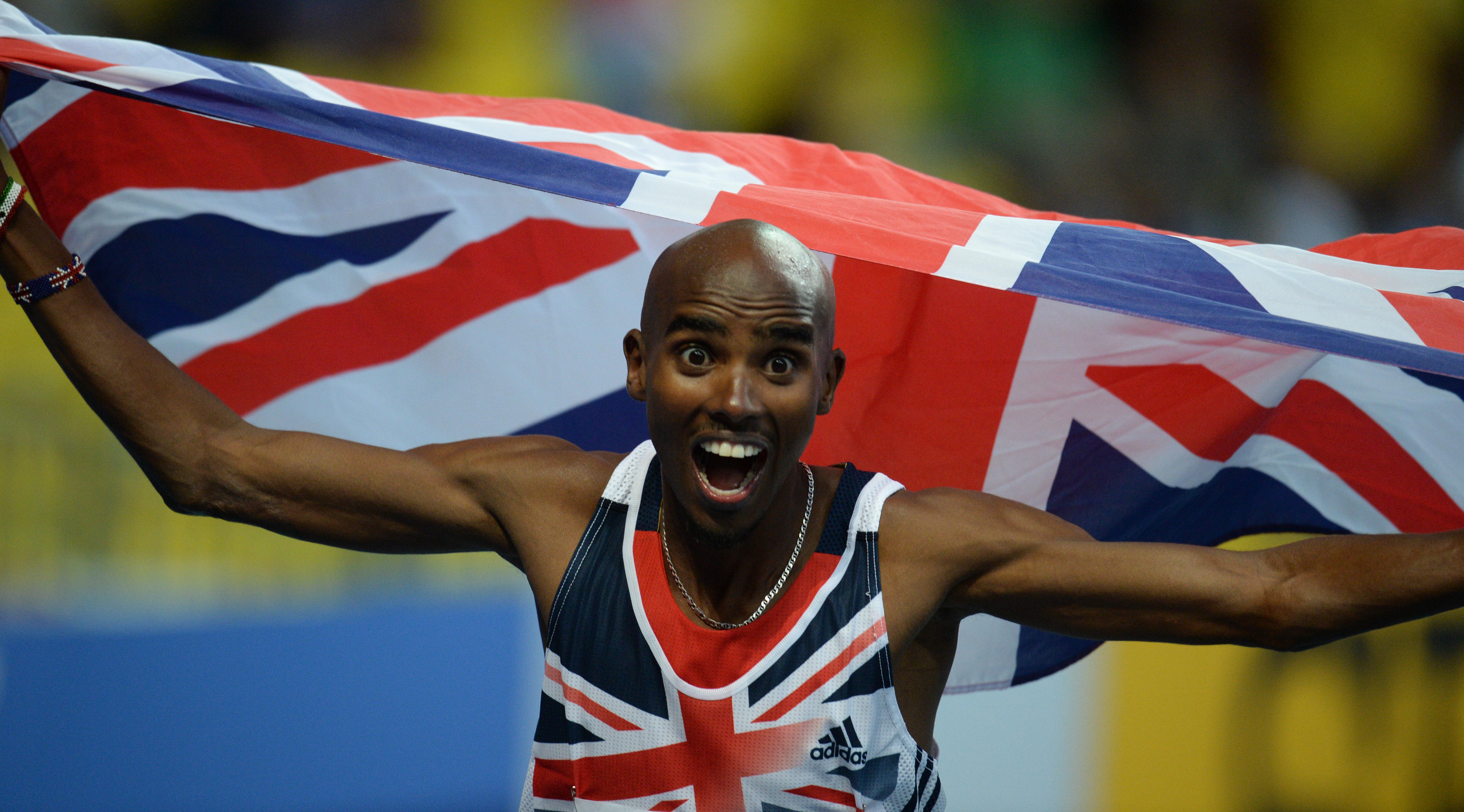 Mo Farah of Great Britain celebrates after winning the Men's 5000m Final at the 14th IAAF World Championships in Athletics at Luzhniki Stadium in Moscow, Russia, 16 August 2013