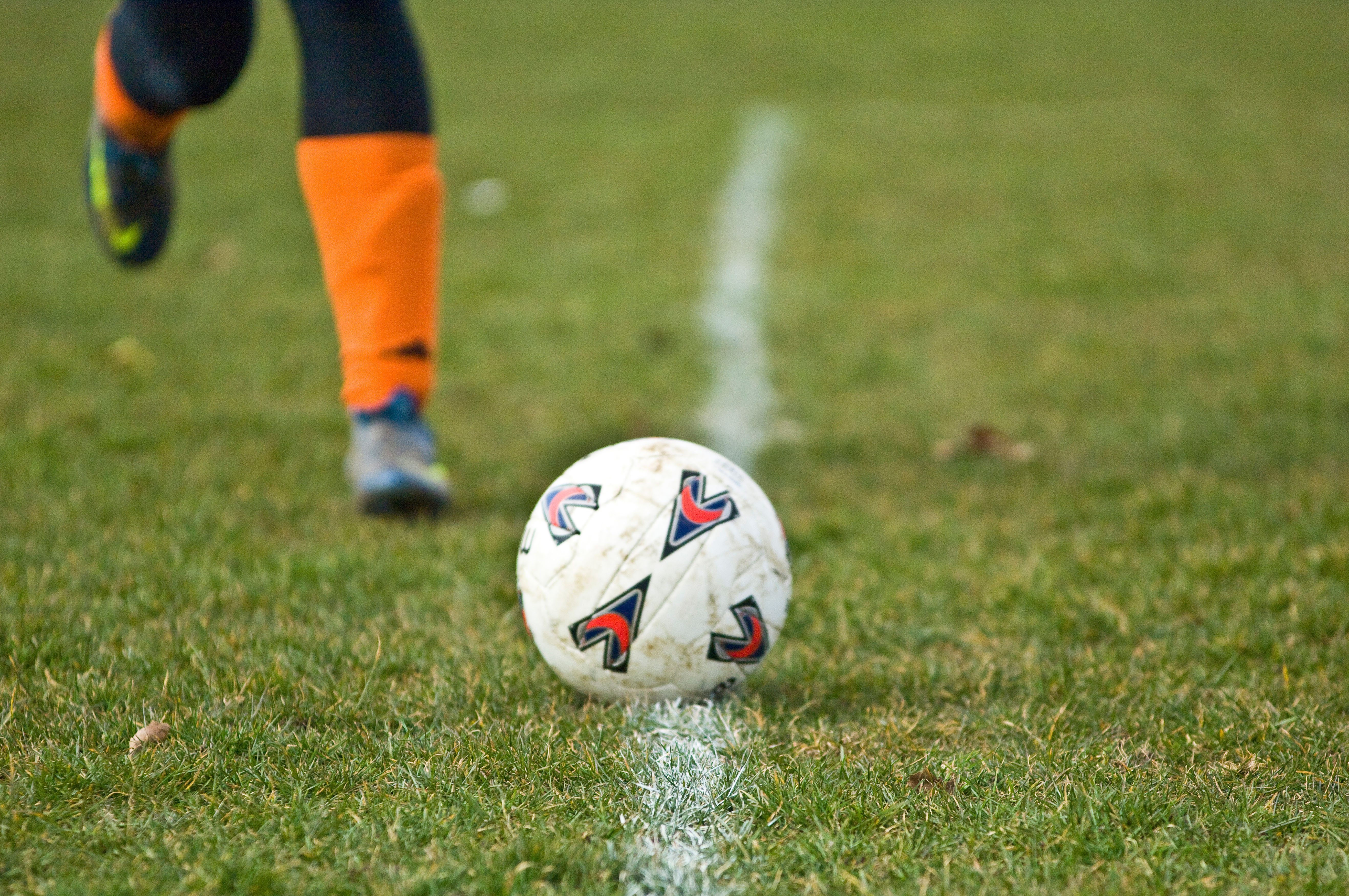 Womans boot and ball