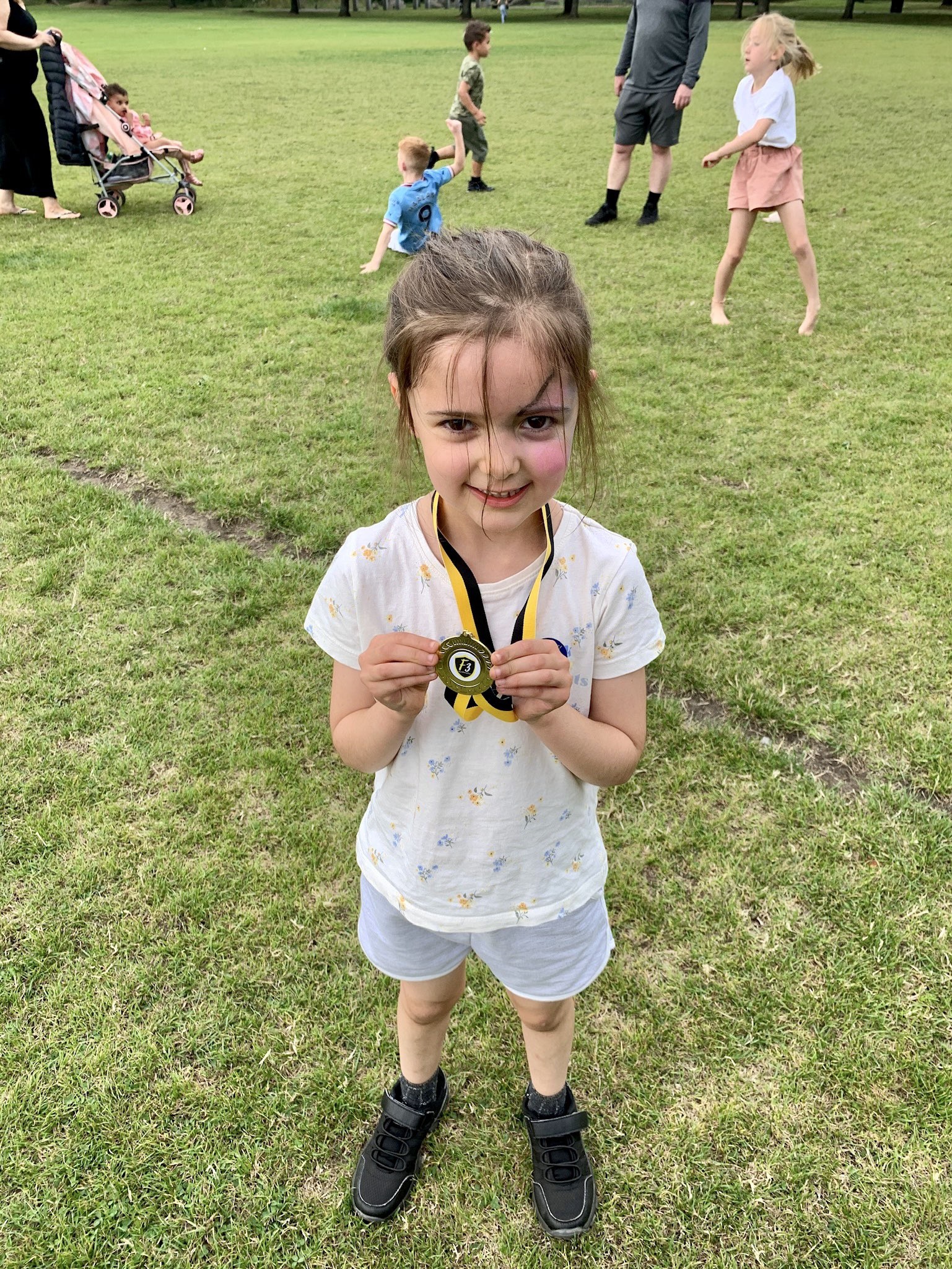 Little girl with a medal