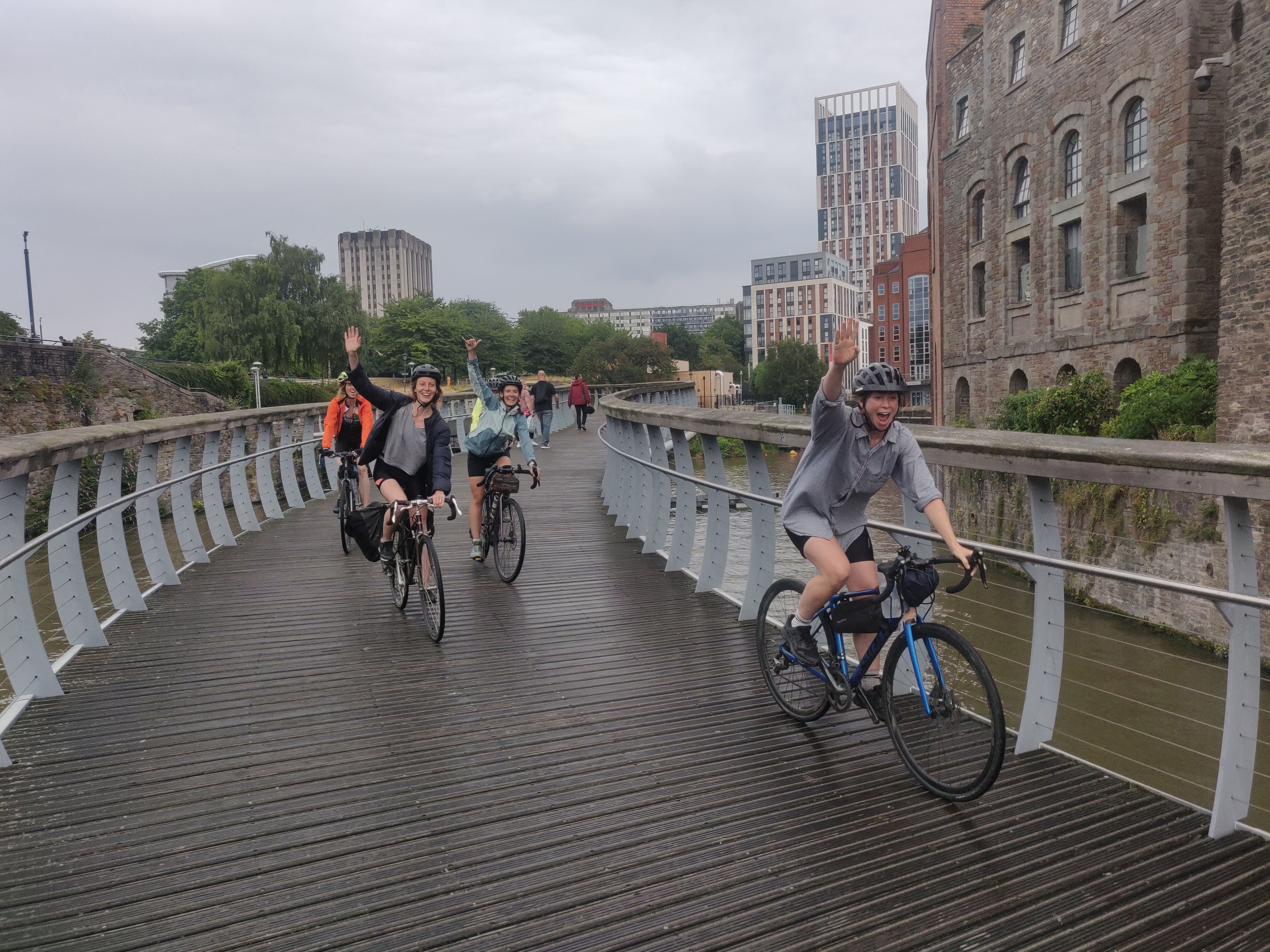 Group cycling on a bridge