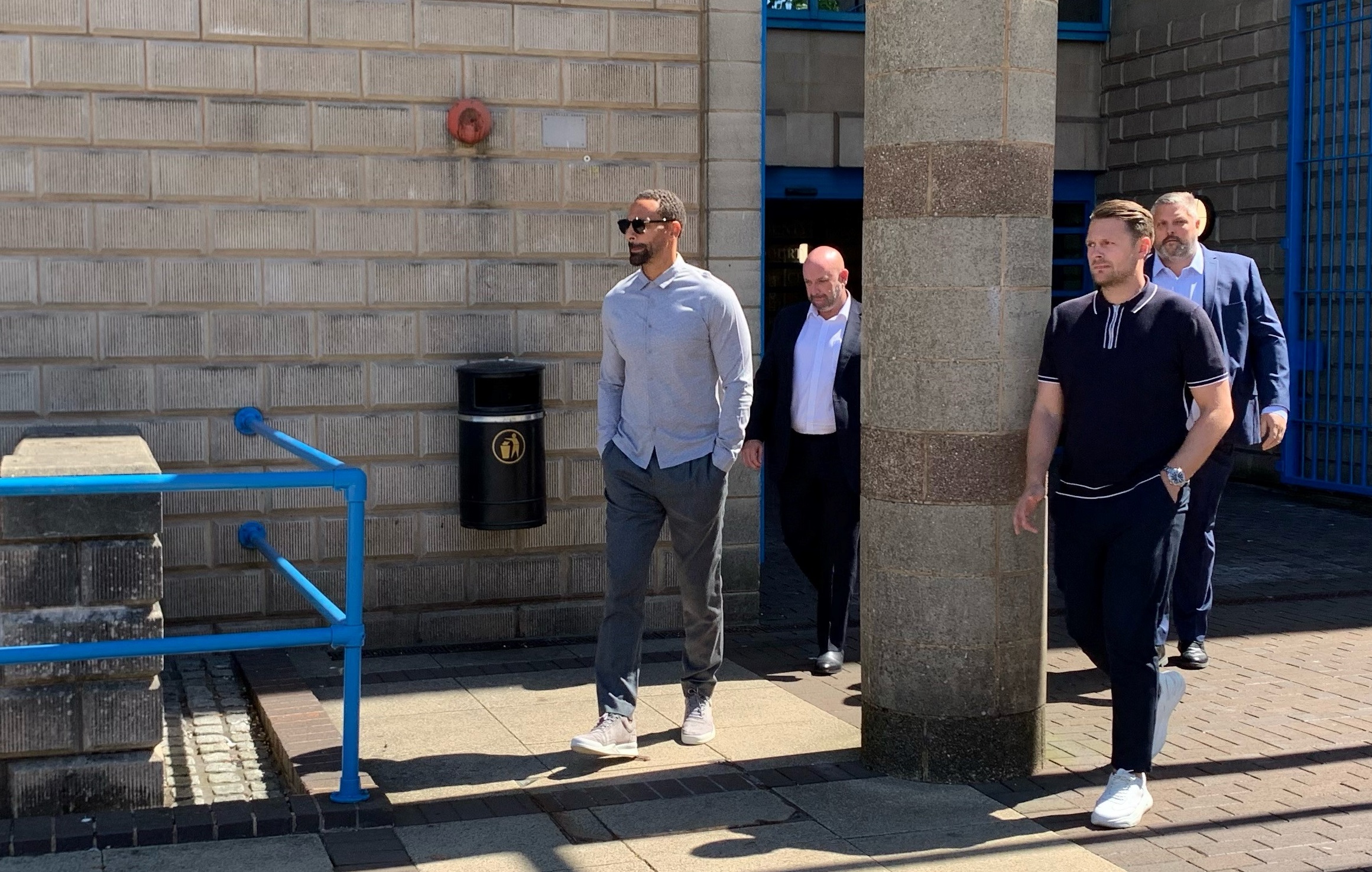 Rio Ferdinand leaving court